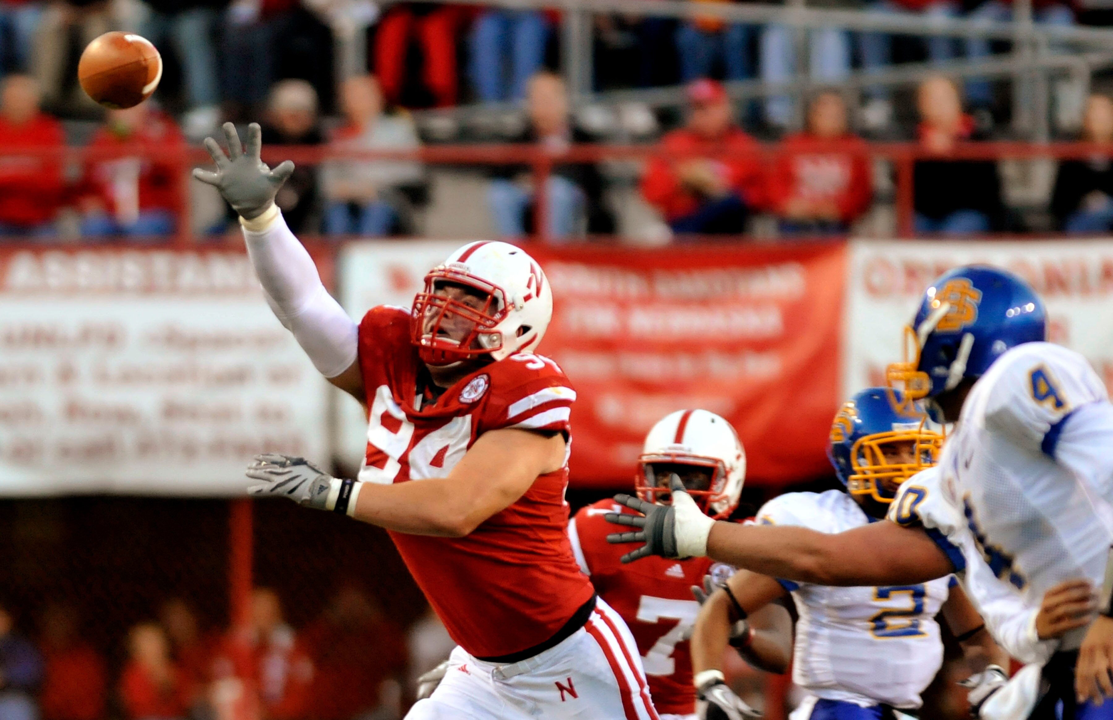 LINCOLN, NE - SEPTEMBER 25: Defensive tackle Jared Crick #94 of the Nebraska Cornhuskers tries to bat down a pass from  quarterback Thomas O'Brien #4 of the South Dakota State Jackrabbits during first half action of their game at Memorial Stadium on Septe