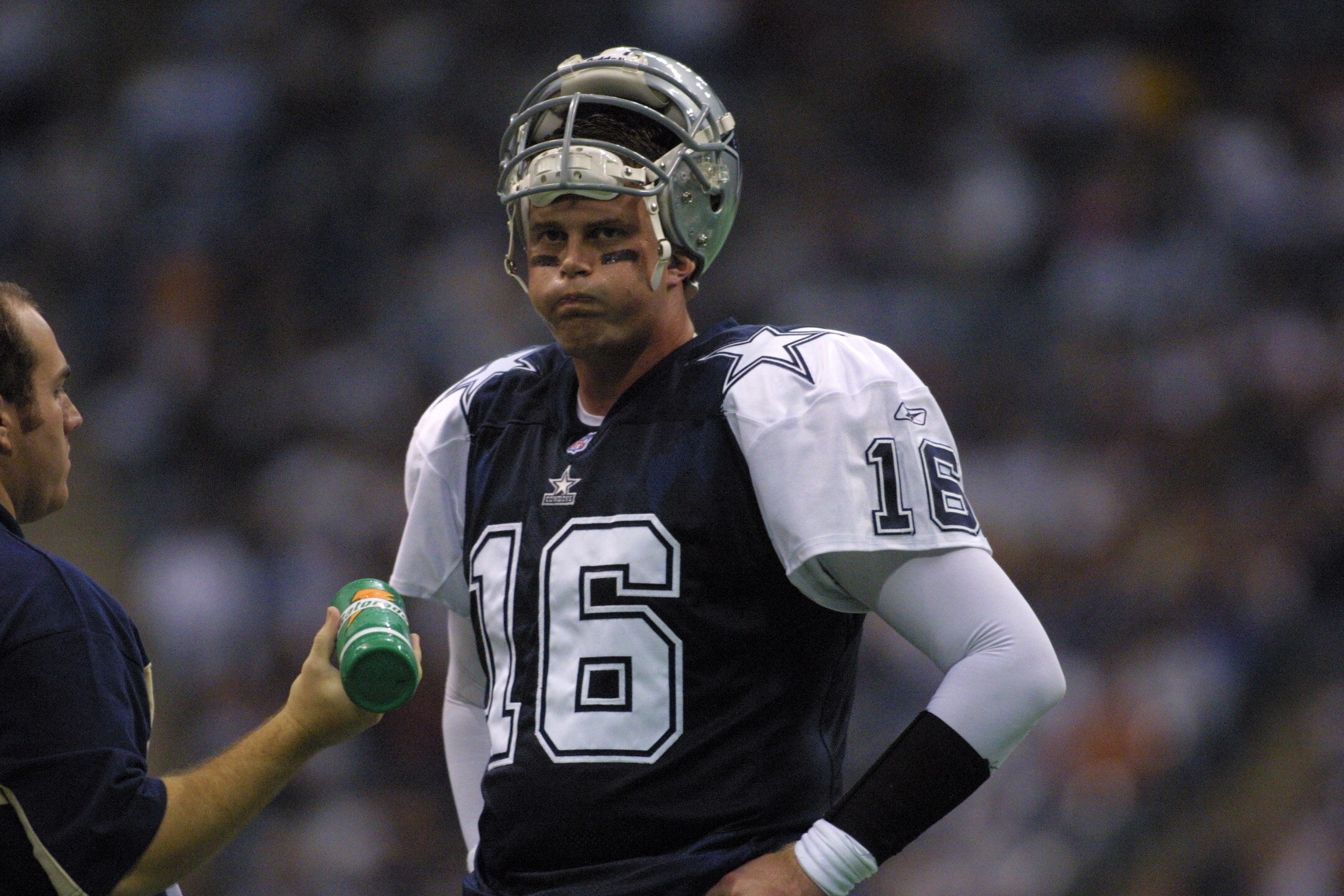 22 Nov 2001 : Quarterback Ryan Leaf of the Dallas Cowboys rests on the sideline during the game against the Denver Broncos at Texas Stadium in Irving, Texas. The Broncos won 26-24. DIGITAL IMAGE. Mandatory Credit: Ronald Martinez/Getty Images