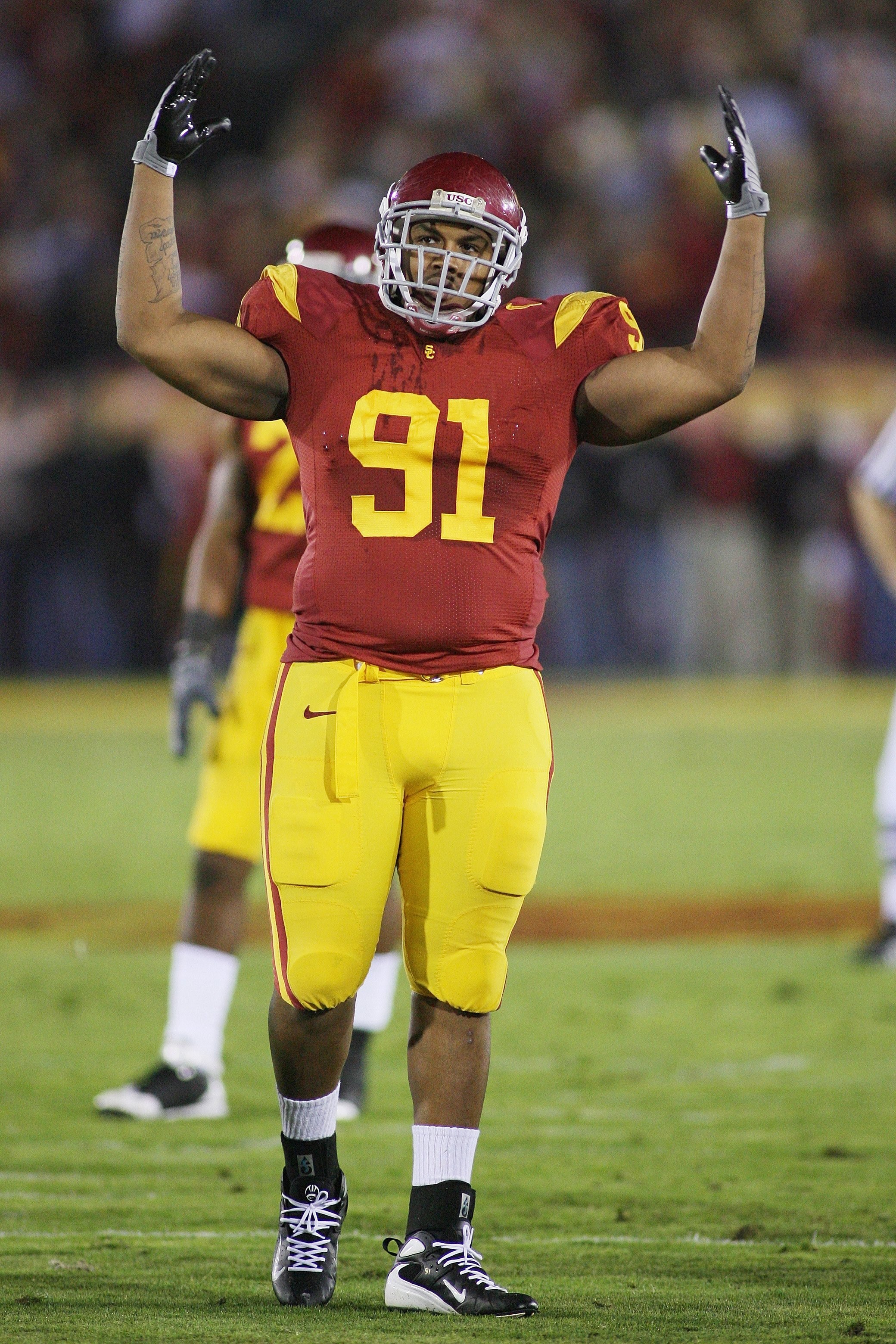 LOS ANGELES - NOVEMBER 29:  Jurrell Casey #91 of the USC Trojans encourages the crowd against the Notre Dame Fighting Irish on November 29, 2008 at the Los Angeles Memorial Coliseum in Los Angeles, California.  USC won 38-3.  (Photo by Jeff Golden/Getty I