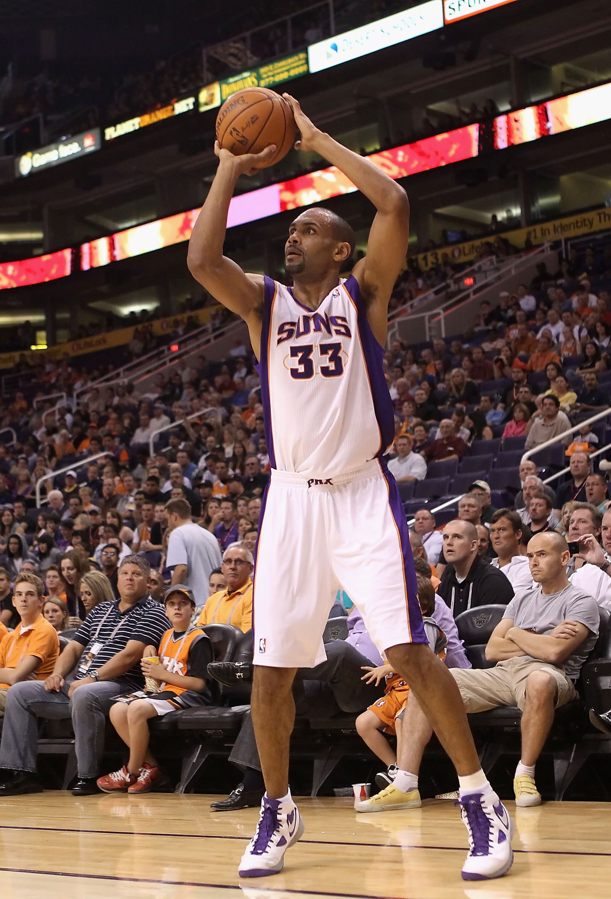 PHOENIX - OCTOBER 19:  Grant Hill #33 of the Phoenix Suns puts up a shot against the Golden State Warriors during the preseason NBA game at US Airways Center on October 19, 2010 in Phoenix, Arizona. NOTE TO USER: User expressly acknowledges and agrees tha