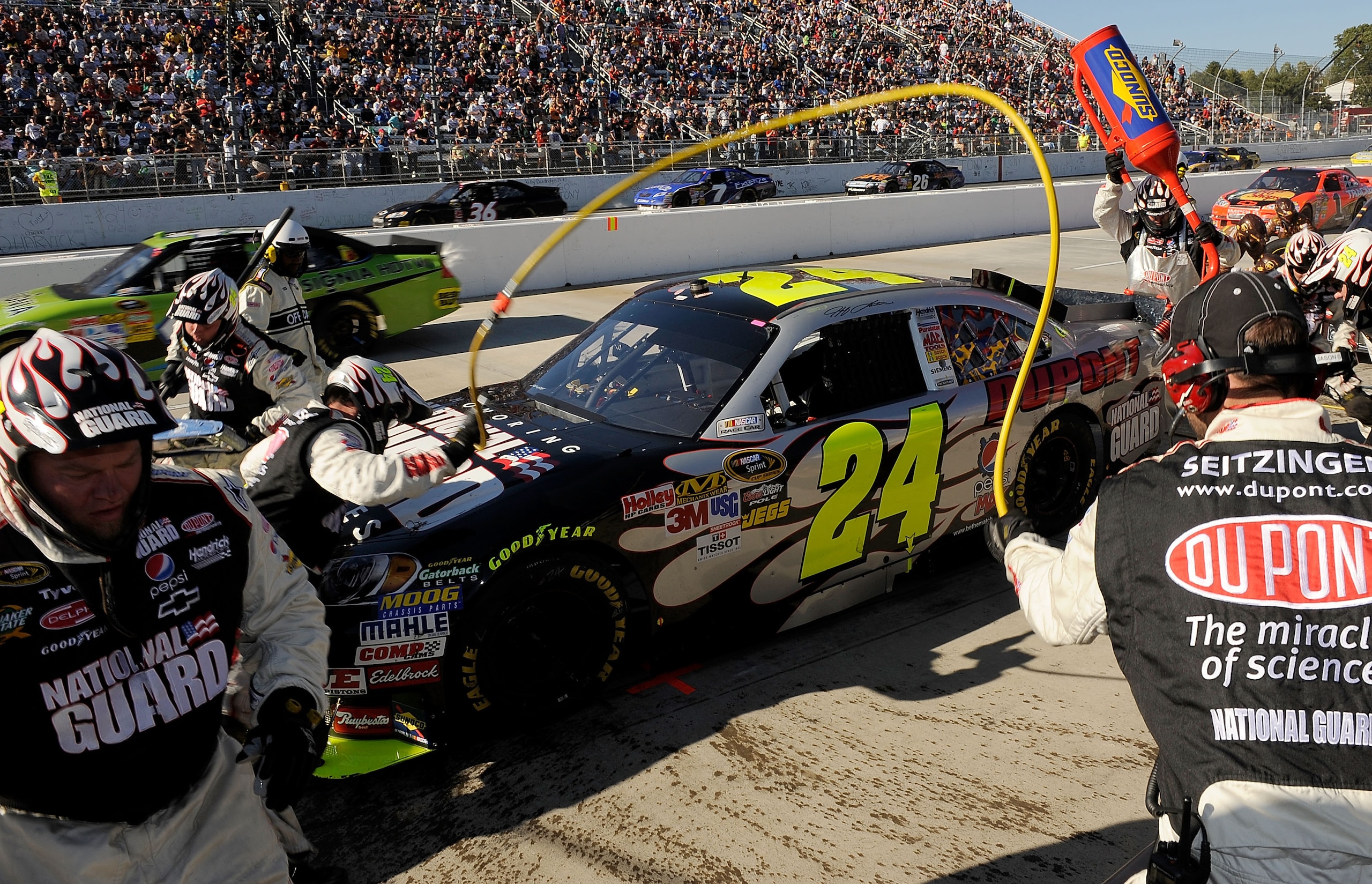 MARTINSVILLE, VA - OCTOBER 24:  Jeff Gordon, driver of the #24 DuPont/National Guard Families Chevrolet, pits during the NASCAR Sprint Cup Series TUMS Fast Relief 500 at Martinsville Speedway on October 24, 2010 in Martinsville, Virginia.  (Photo by Rusty