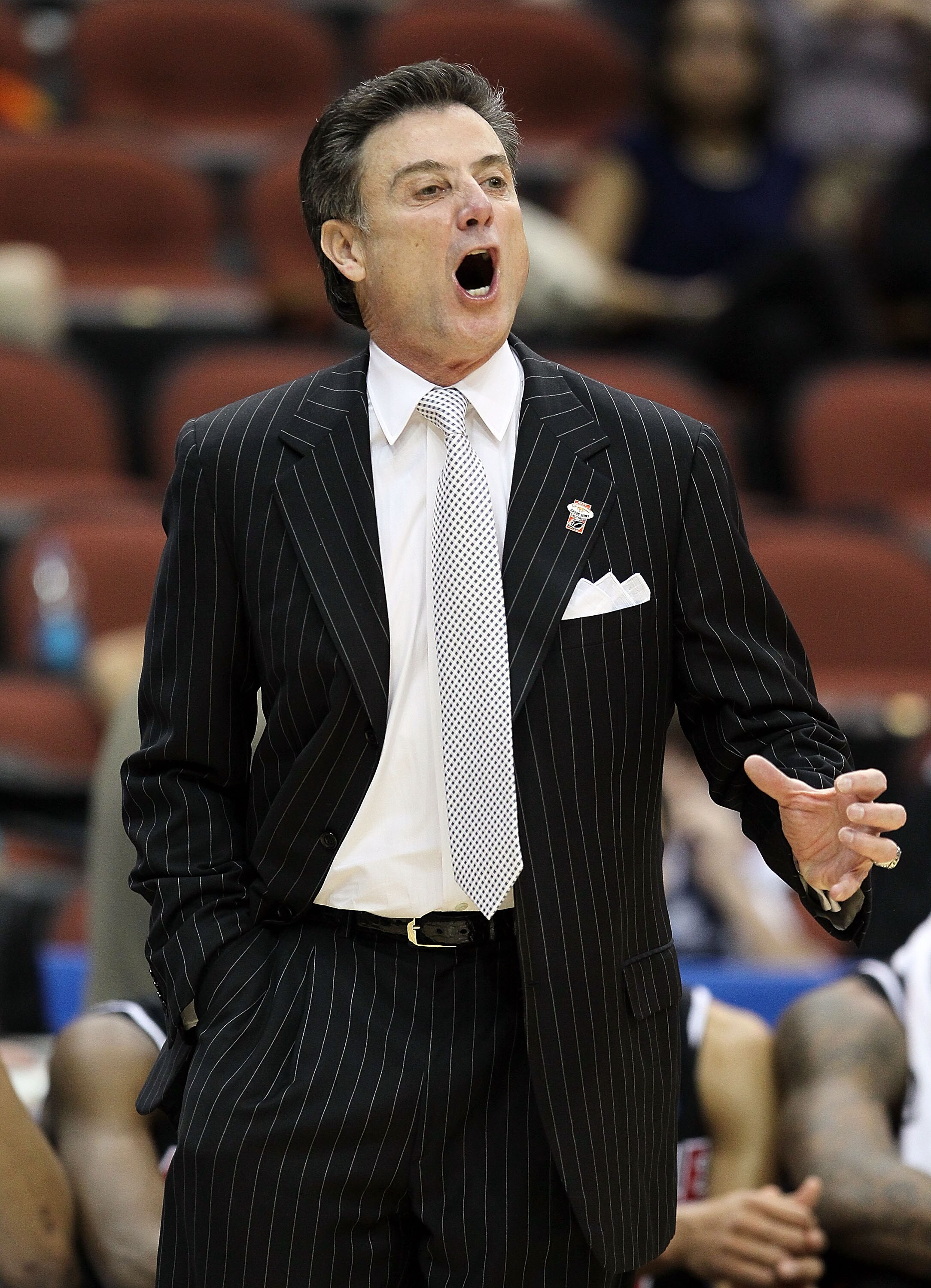 JACKSONVILLE, FL - MARCH 19: Rick Pitino the Head Coach of the Louisville Cardinals gives instructions to his team in the game against the California Golden Bears during the first round of the 2010 NCAA men's basketball tournament at Jacksonville Veteran'