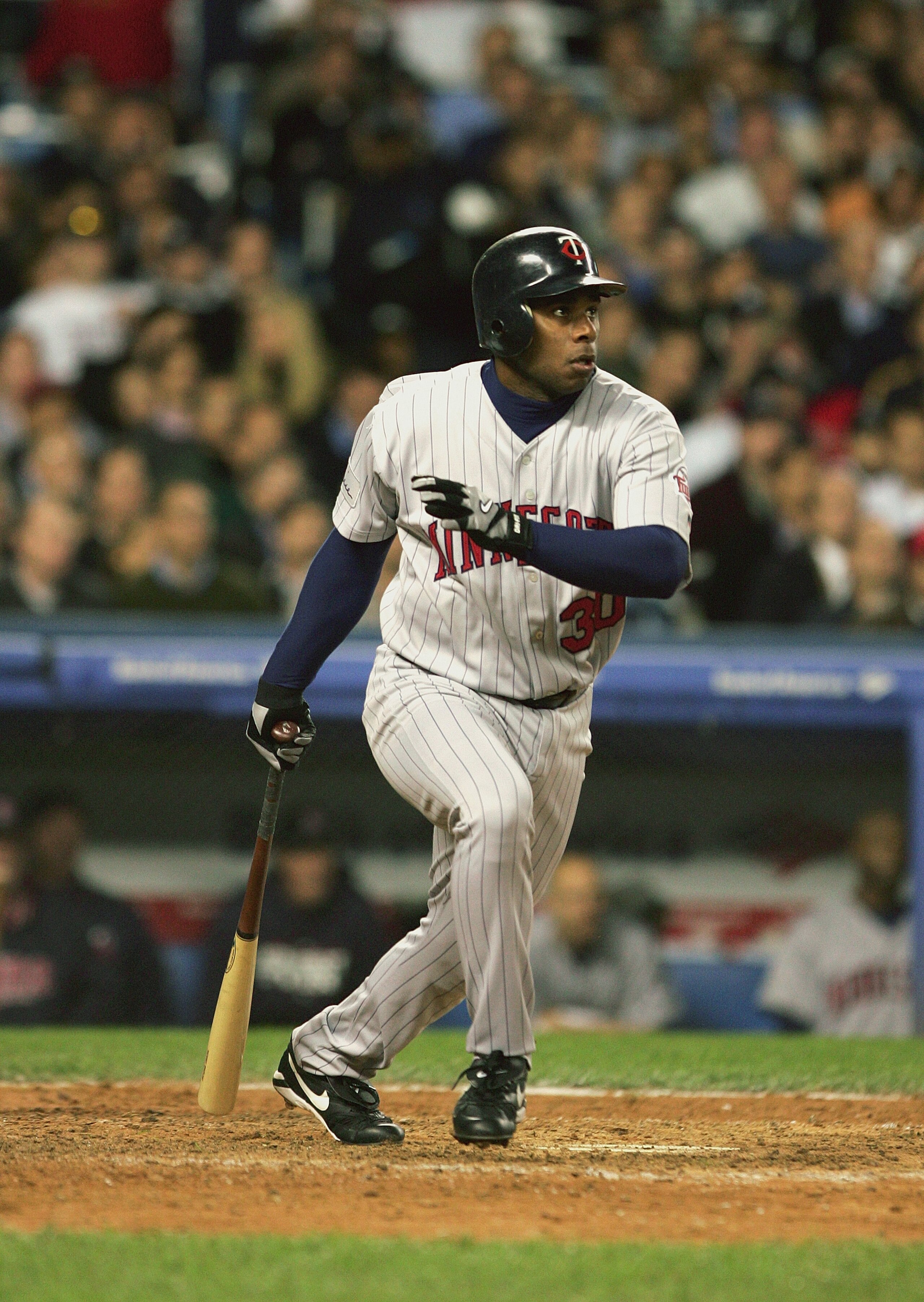 NEW YORK - OCTOBER 6:  Designated hitter Jose Offerman #30 of the Minnesota Twins runs during Game 2 of the American League Division Series with the New York Yankees on October 6, 2004 at Yankee Stadium in the Bronx borough of New York City. The Yankees w