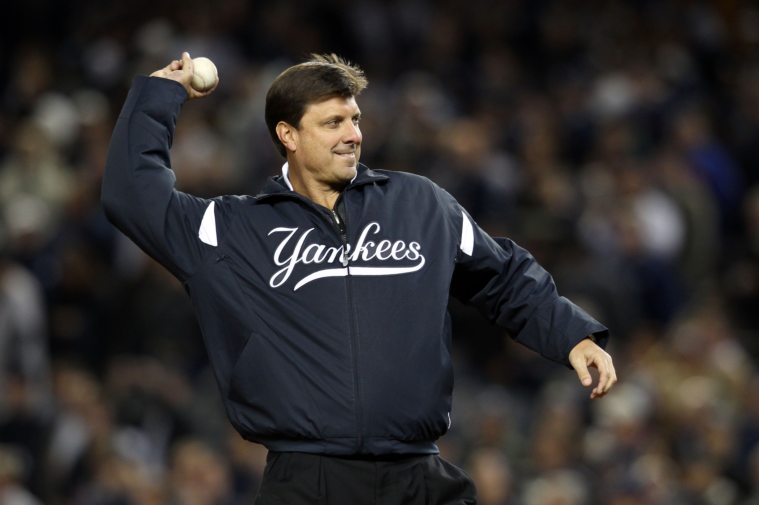 NEW YORK - OCTOBER 18:  Former New York Yankee Tino Martinez throws out the ceremonial first pitch prior to the Yankees playing against the Texas Rangers in Game Three of the ALCS during the 2010 MLB Playoffs at Yankee Stadium on October 18, 2010 in New Y