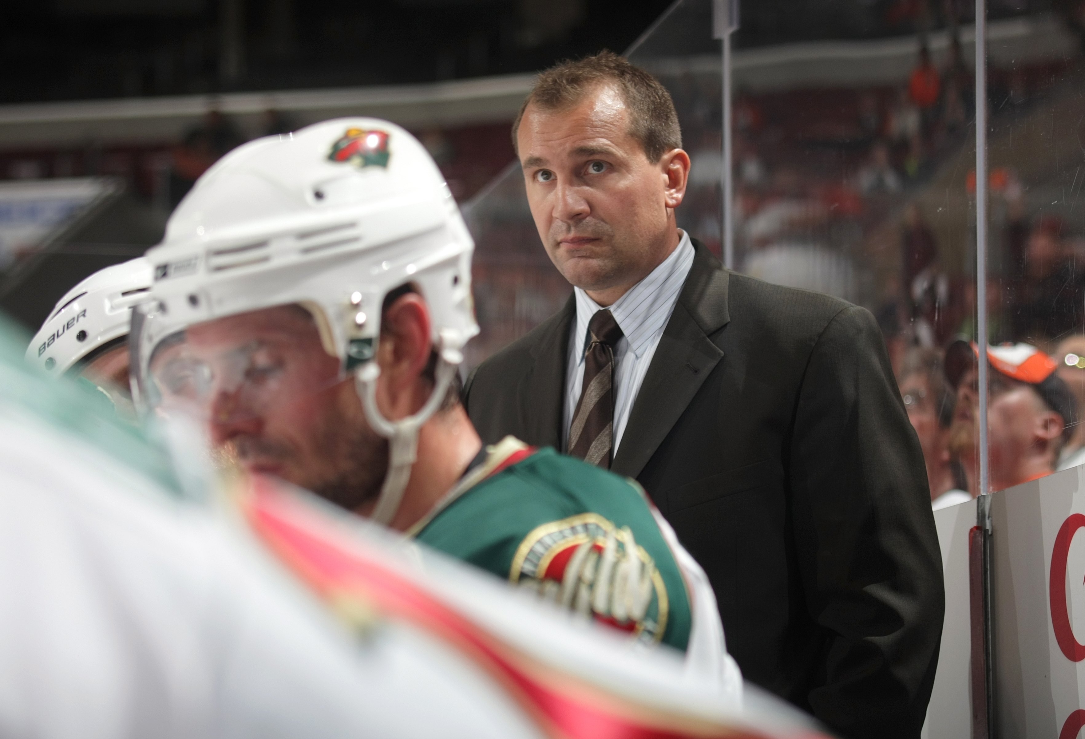 PHILADELPHIA - SEPTEMBER 29:  Head Coach Todd Richards of the Minnesota Wild looks on from the bench area during the preseason NHL game against the Philadelphia Flyers at the Wachovia Center on September 29, 2009 in Philadelphia, Pennsylvania.  The Wild d