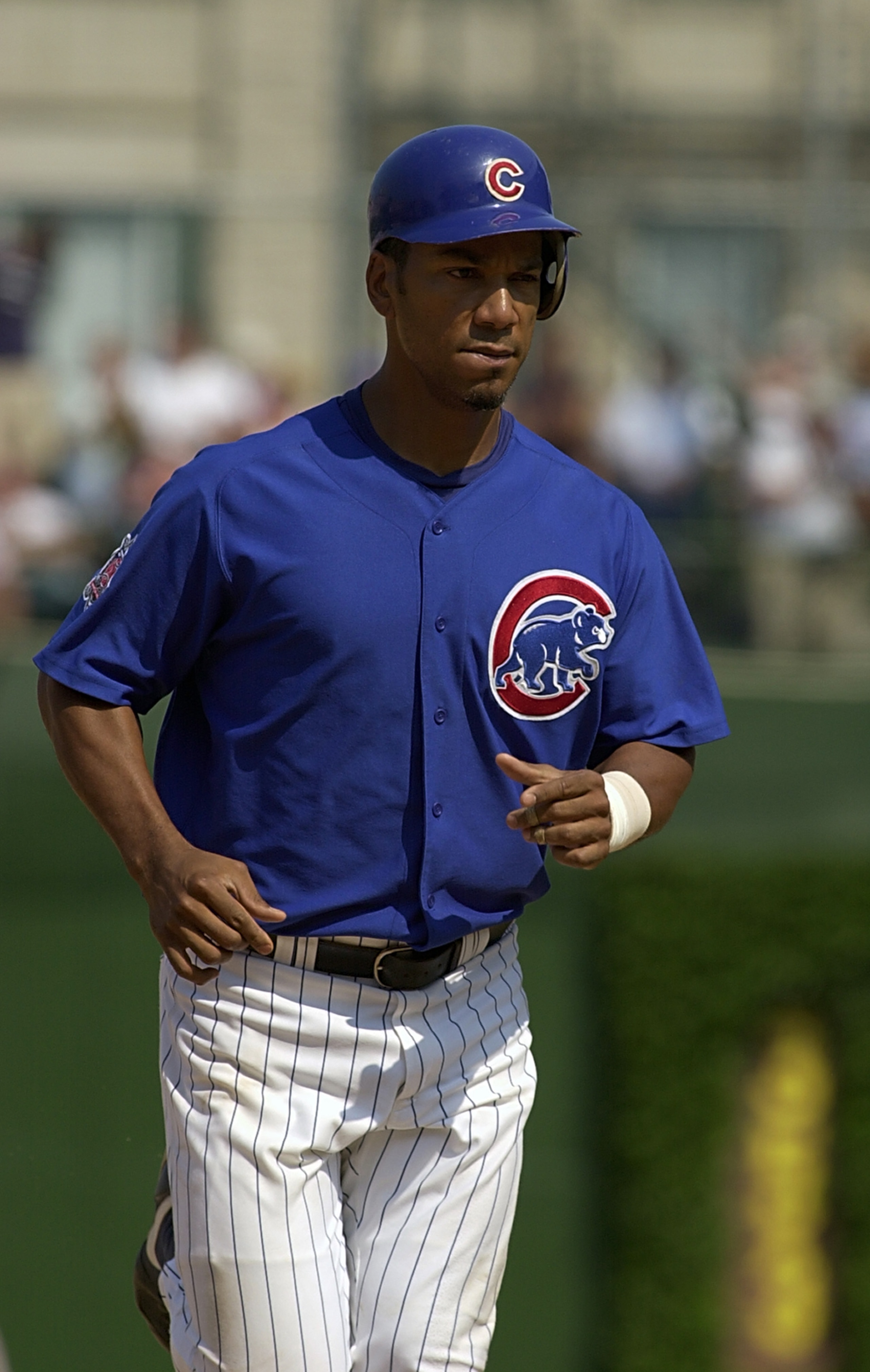 CHICAGO - AUGUST 13:  Left fielder Moises Alou #18 of the Chicago Cubs runs during the National League game against the Houston Astros at Wrigley Field on August 13, 2003 in Chicago, Illinois. The Cubs defeated the Astros 6-4.  (Photo by Jonathan Daniel/G
