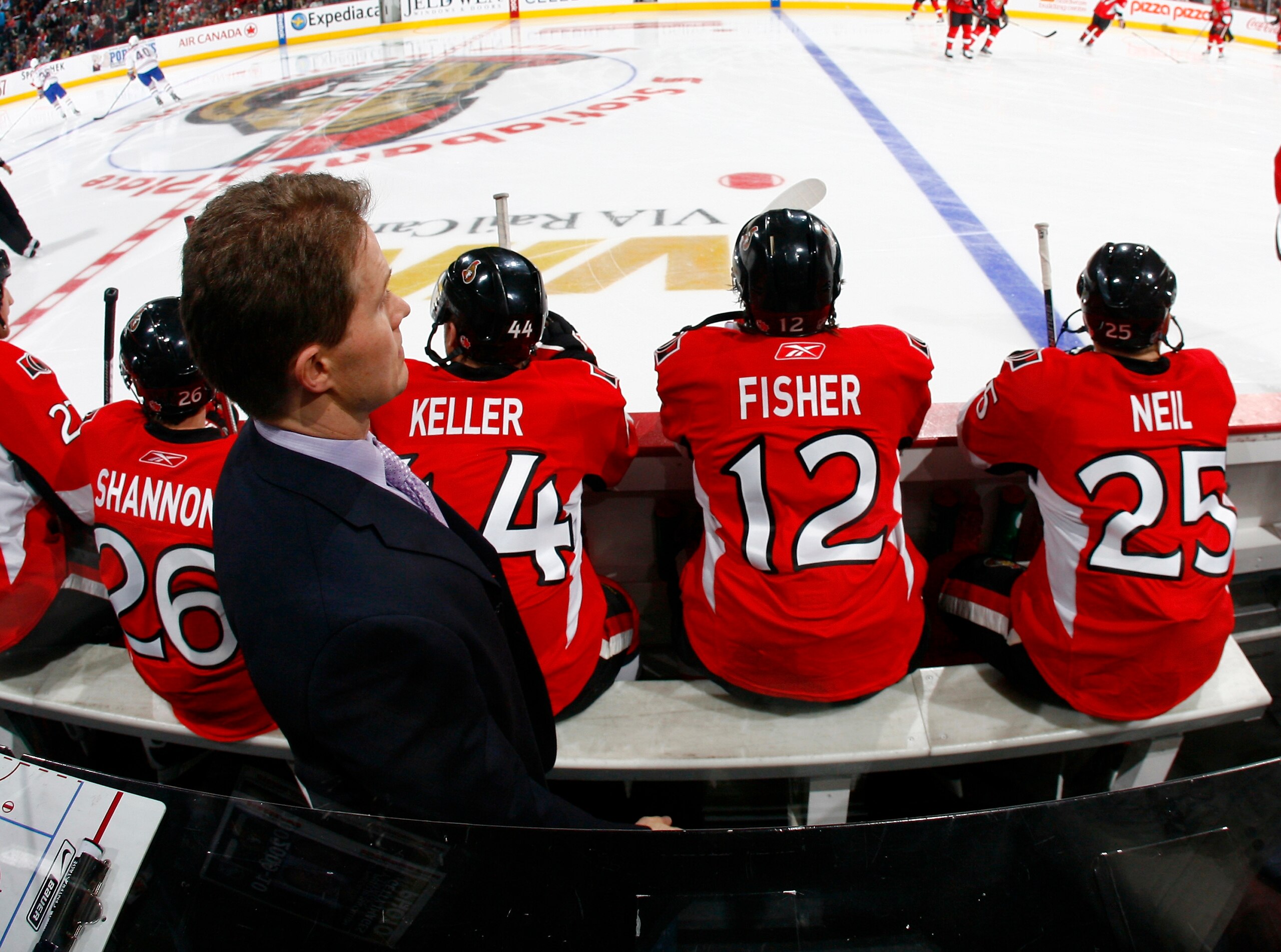OTTAWA, ON - DECEMBER 28:  Cory Clouston of the Ottawa Senators walks the bench before the start of a game against the Montreal Canadiens at Scotiabank Place on December 28, 2009 in Ottawa, Canada.  The Ottawa Senators defeated the Montreal Canadiens 4-2.