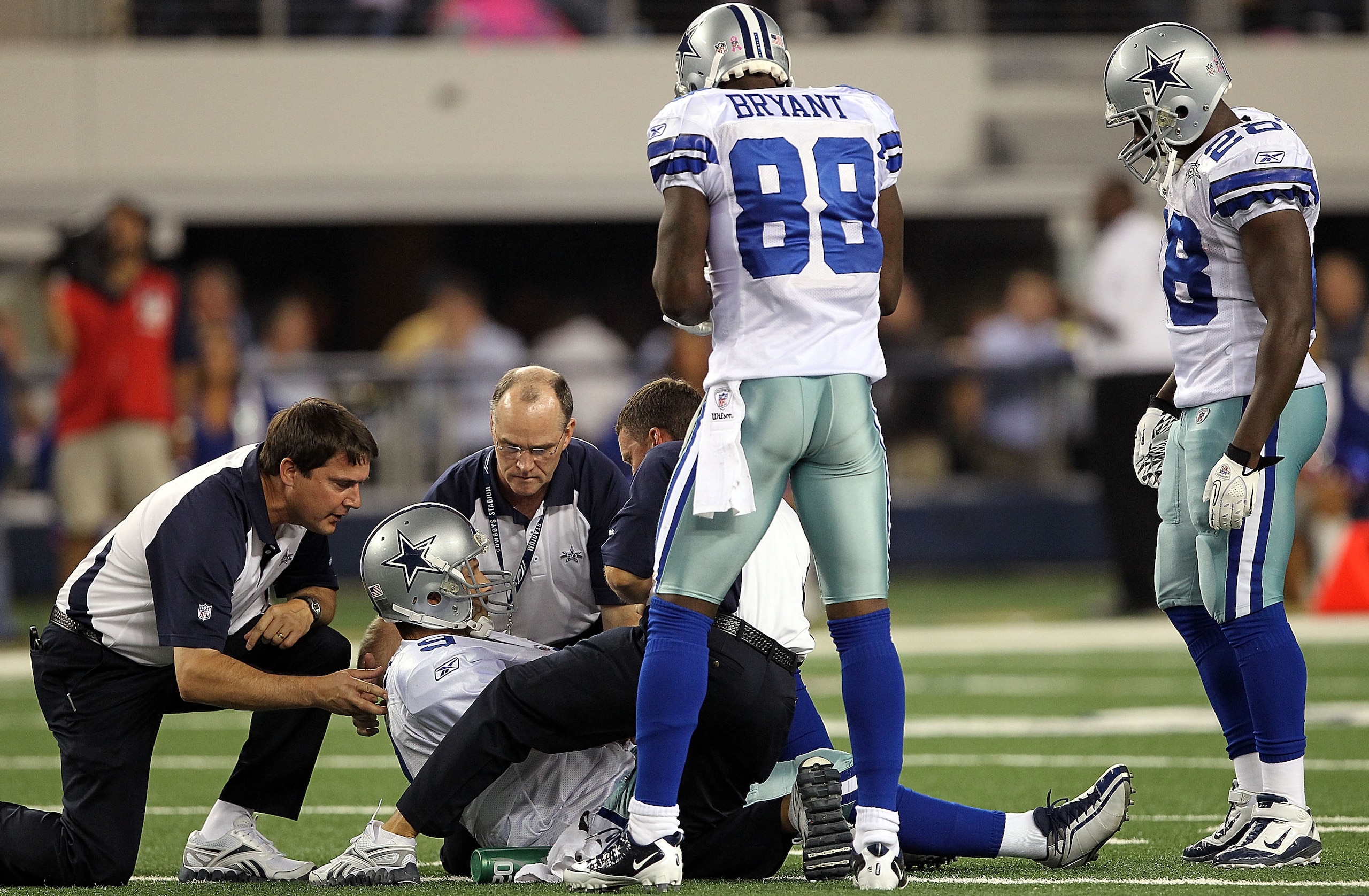 ARLINGTON, TX - OCTOBER 25: Quarterback Tony Romo #9 of the Dallas Cowboys lies on the field after a left shoulder injury in the second quarter against the New York Giants at Cowboys Stadium on October 25, 2010 in Arlington, Texas. (Photo by Ronald Mart ARLINGTON, TX - OCTOBER 25: Quarterback Tony Romo #9 of the Dallas Cowboys lies on the field after a left shoulder injury in the second quarter against the New York Giants at Cowboys Stadium on October 25, 2010 in Arlington, Texas. (Photo by Ronald Mart