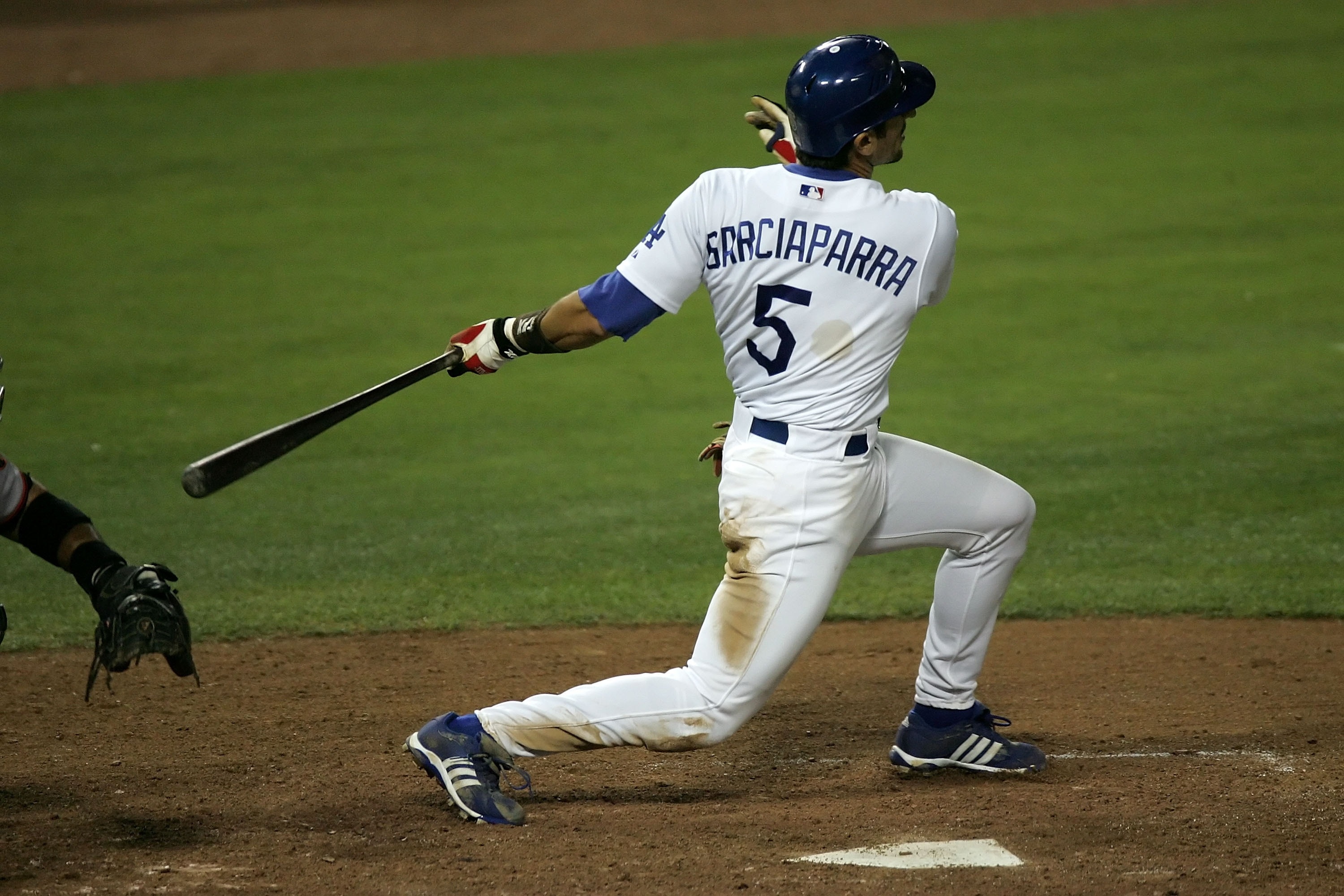 LOS ANGELES, CA - AUGUST 01:  Nomar Garciaparra #5 of the Los Angeles Dodgers hits a two-run homerun in the eighth inning against the San Francisco Giants at Dodger Stadium on August 1, 2007 in Los Angeles, California.  (Photo by Lisa Blumenfeld/Getty Ima