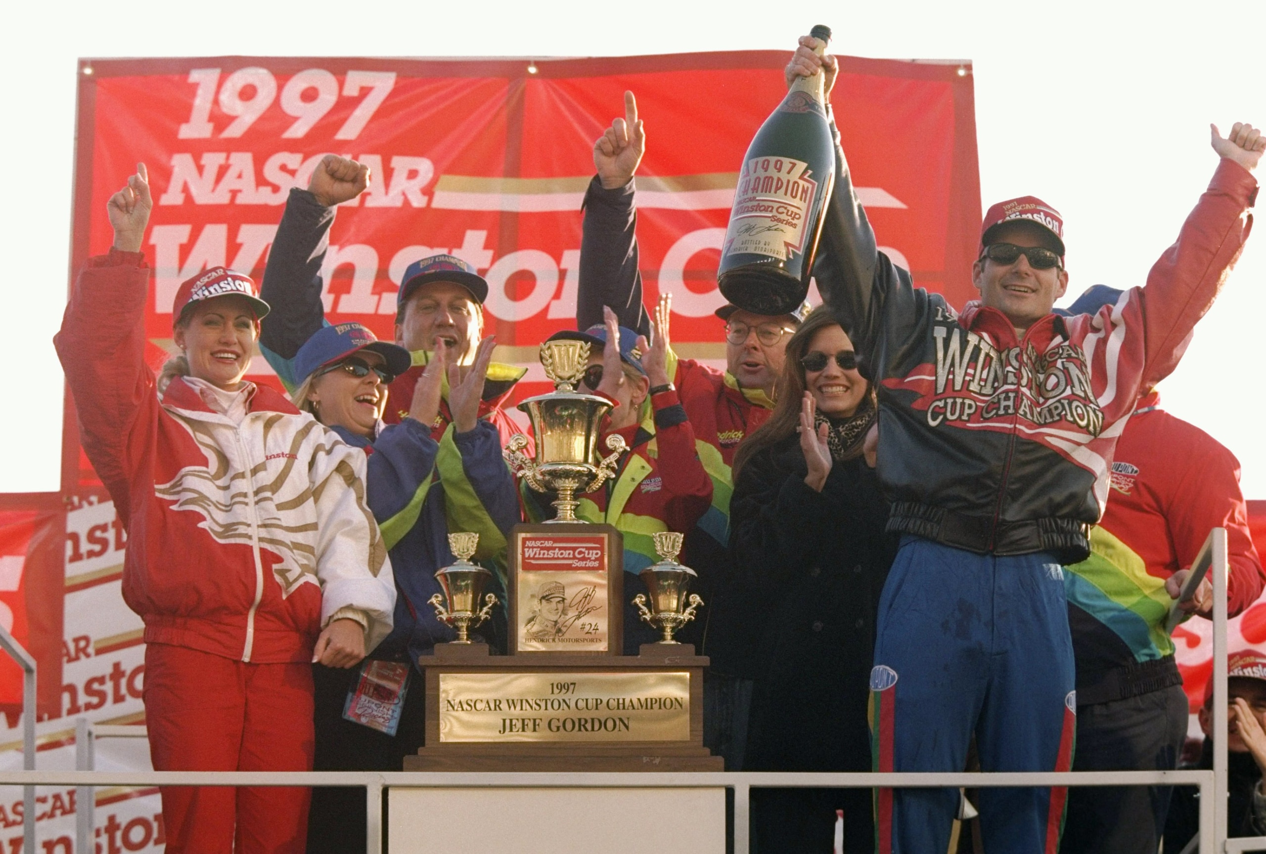 16 Nov 1997: Jeff Gordon celebrates winning the NASCAR Championship after the NAPA 500 at the Atlanta Motor Speedway in Hampton, Georgia.