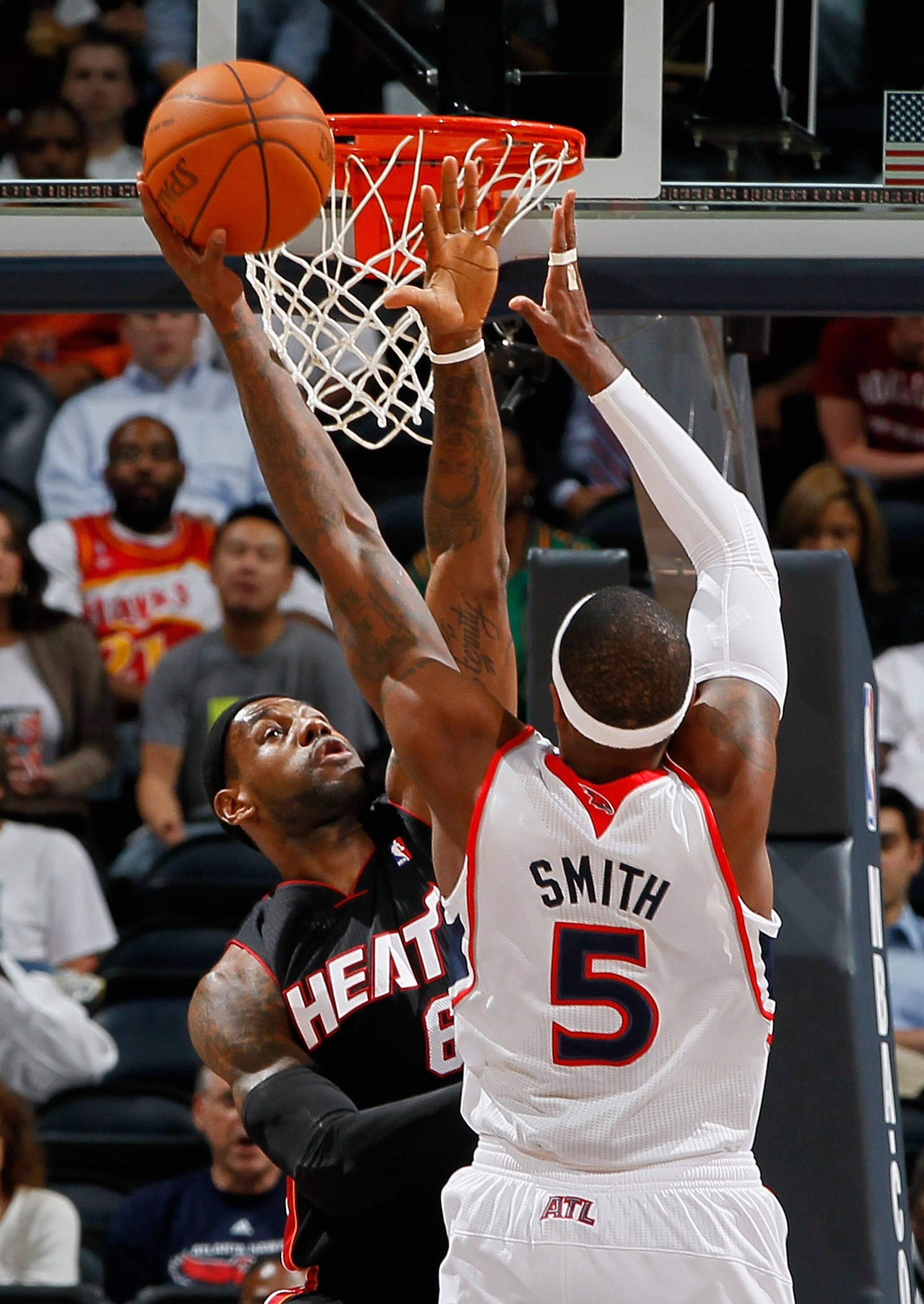 ATLANTA - OCTOBER 21:  LeBron James #6 of the Miami Heat defends the basket against Josh Smith #5 of the Atlanta Hawks at Philips Arena on October 21, 2010 in Atlanta, Georgia.  (Photo by Kevin C. Cox/Getty Images)