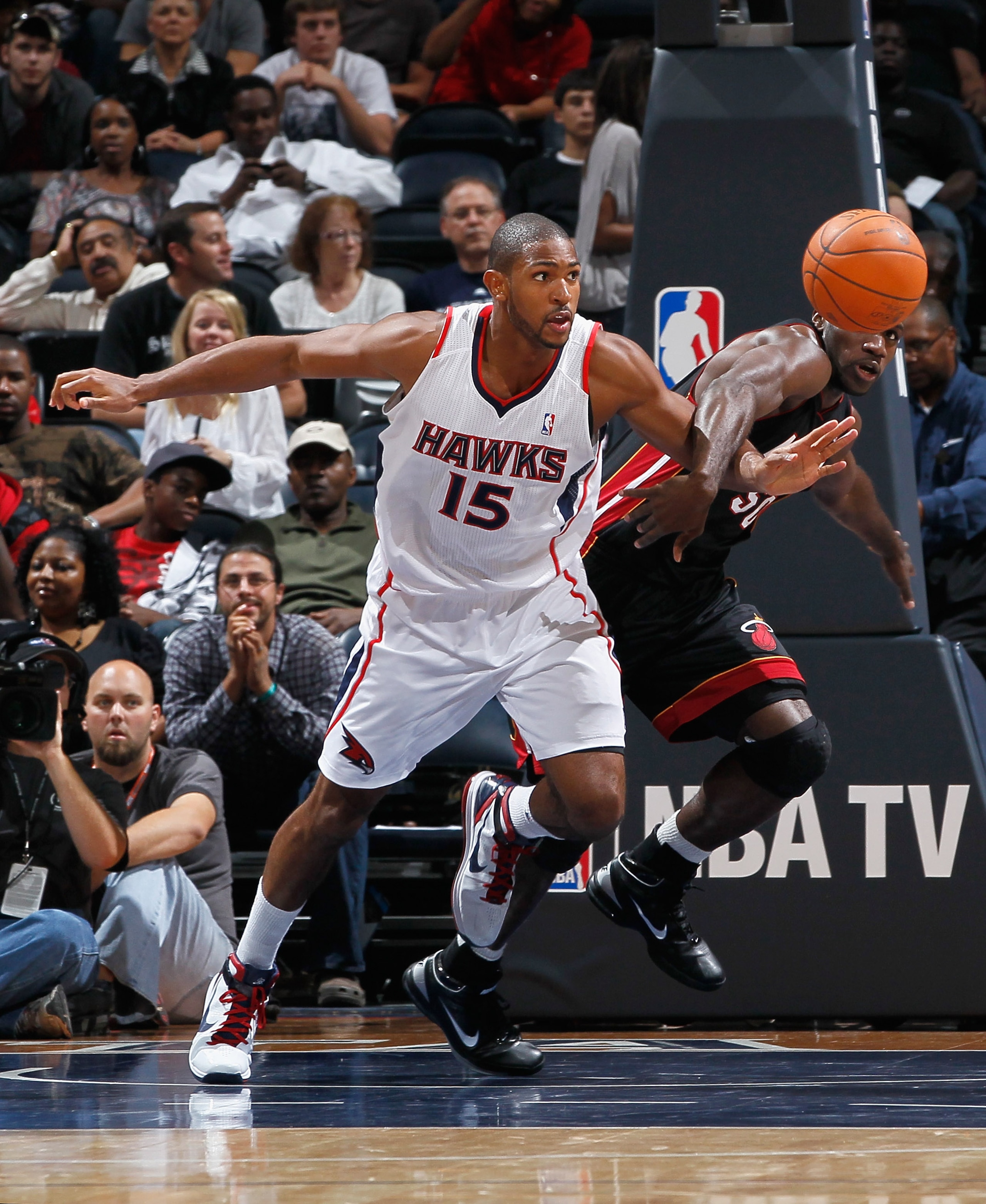 ATLANTA - OCTOBER 21:  Al Horford #15 of the Atlanta Hawks battles for a rebound against Joel Anthony #50 of the Miami Heat at Philips Arena on October 21, 2010 in Atlanta, Georgia.  (Photo by Kevin C. Cox/Getty Images)