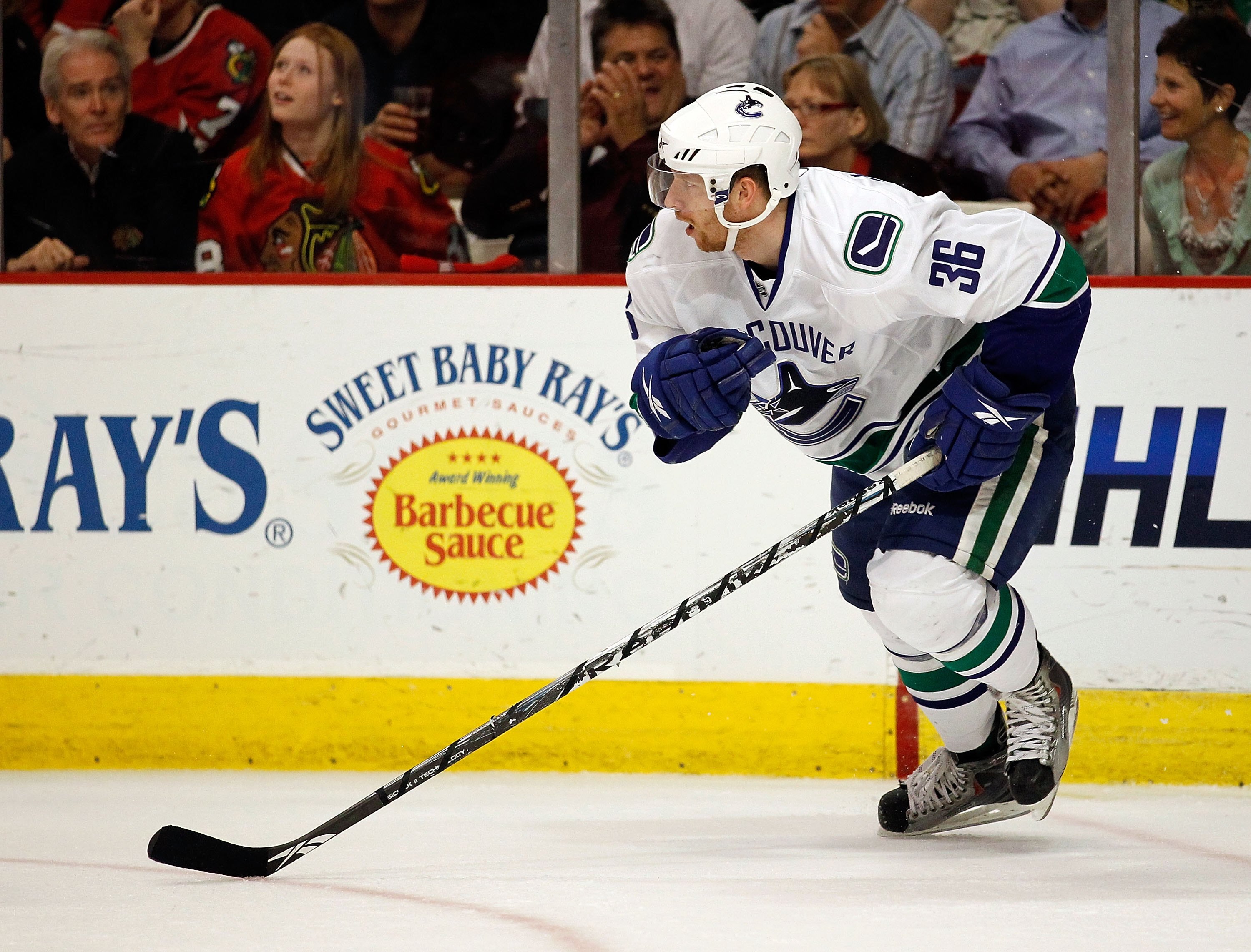 CHICAGO - MAY 03: Jannik Hansen #36 of the Vancouver Canucks skates up the ice against the Chicago Blackhawks in Game Two of the Western Conference Semifinals during the 2010 NHL Stanley Cup Playoffs at United Center on May 3, 2010 in Chicago, Illinois. T