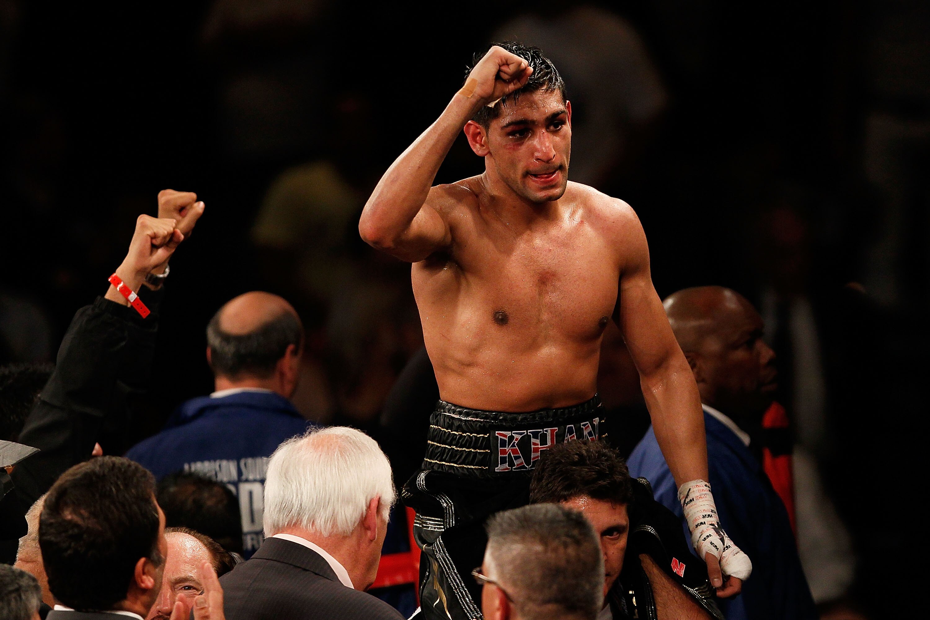 NEW YORK - MAY 15:  Amir Khan of Great Britain celebrates after defeating Paulie Malignaggi by TKO in the 11th round of his WBA light welterweight title fight at Madison Square Garden on May 15, 2010 in New York City.  (Photo by Chris Trotman/Getty Images