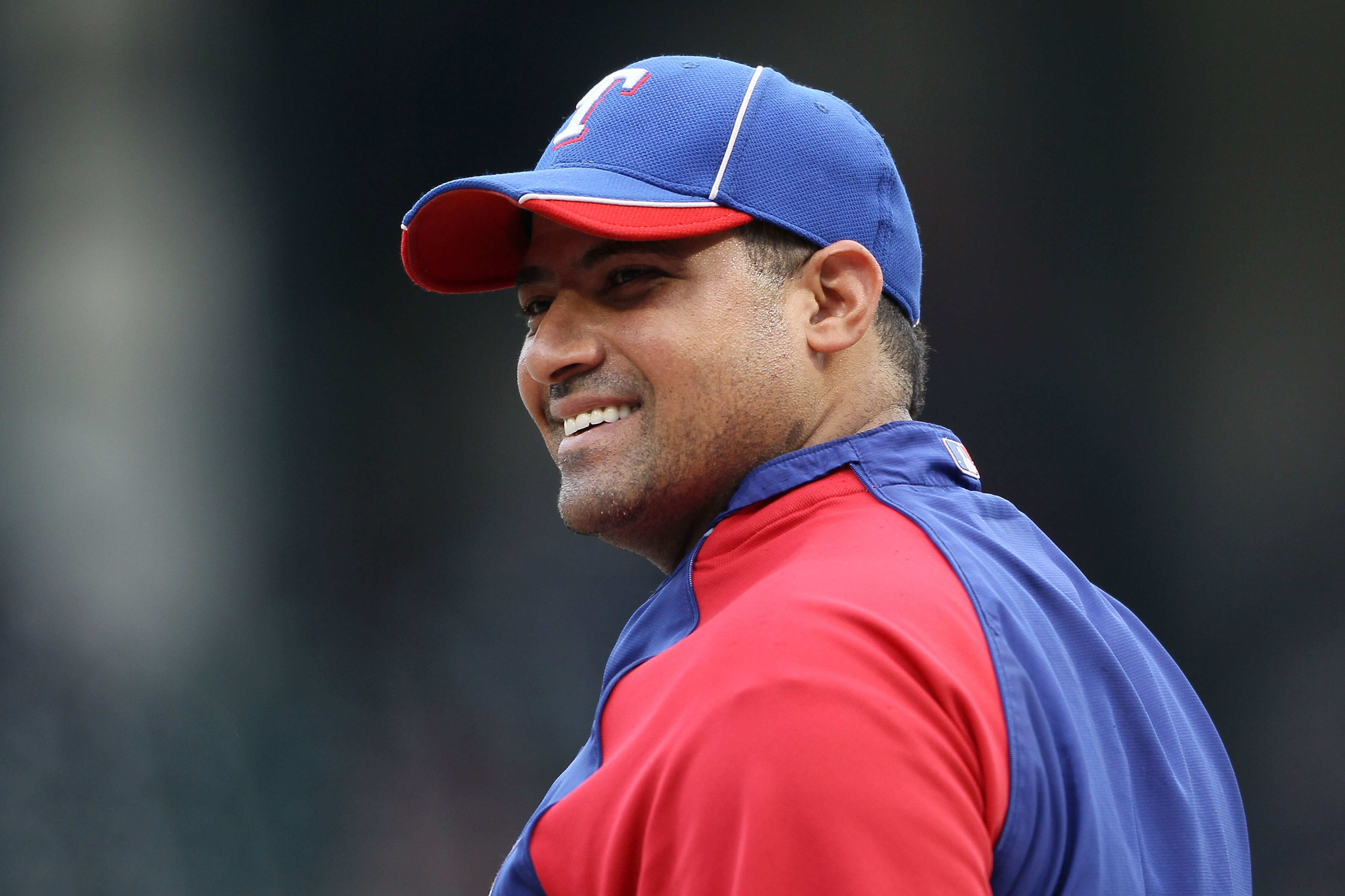 ARLINGTON, TX - OCTOBER 22:  Bengie Molina #11 of the Texas Rangers looks on during batting practice prior to playing the New York Yankees in Game Six of the ALCS during the 2010 MLB Playoffs at Rangers Ballpark in Arlington on October 22, 2010 in Arlingt