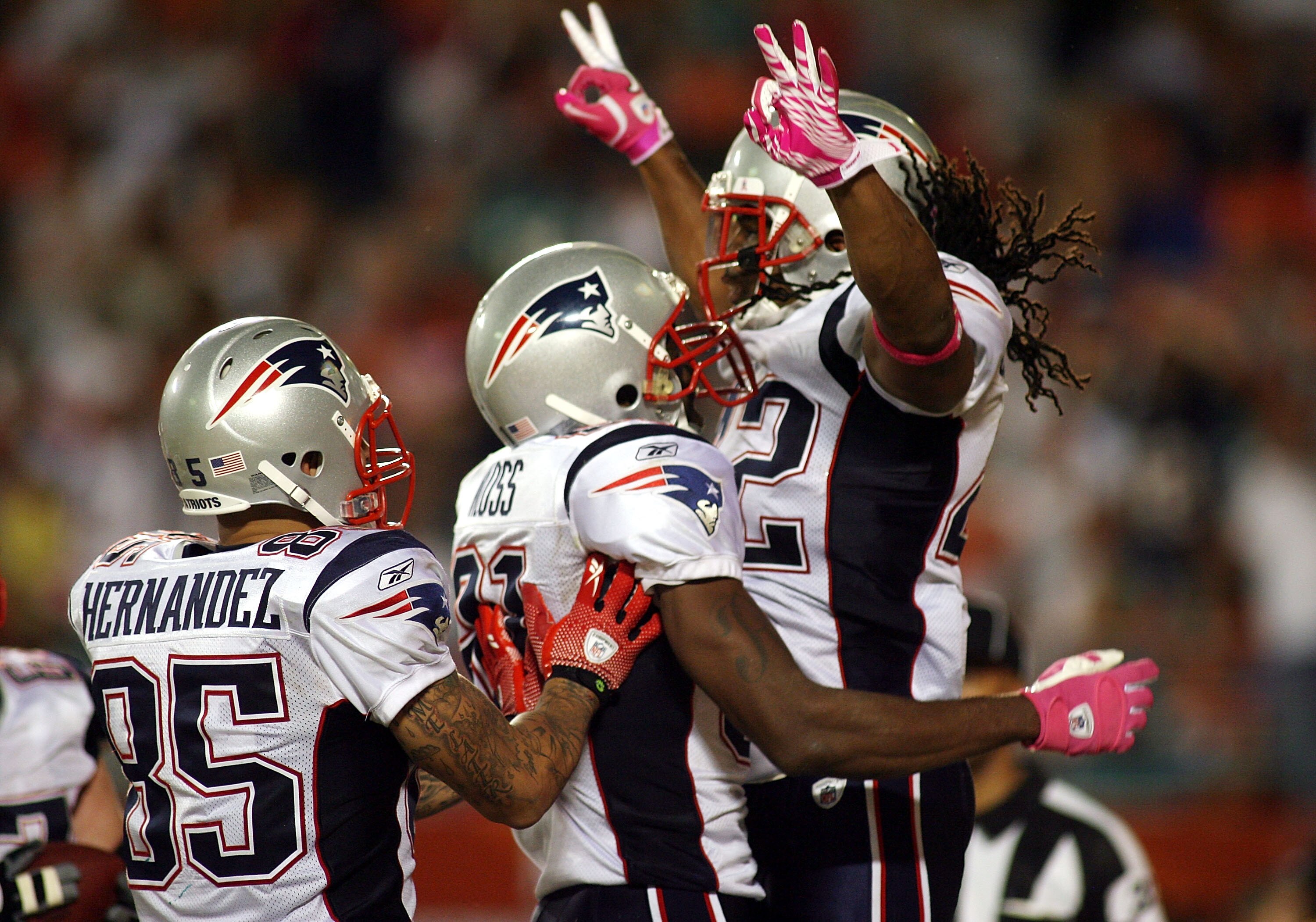MIAMI - OCTOBER 04: Running backBenjarvus Green-Ellis #42 of the New England Patriots celebrates a touchdown with teammate Randy Moss #81 against the Miami Dolphins at Sun Life Stadium on October 4, 2010 in Miami, Florida. (Photo by Marc Serota/Getty Im MIAMI - OCTOBER 04: Running backBenjarvus Green-Ellis #42 of the New England Patriots celebrates a touchdown with teammate Randy Moss #81 against the Miami Dolphins at Sun Life Stadium on October 4, 2010 in Miami, Florida. (Photo by Marc Serota/Getty Im