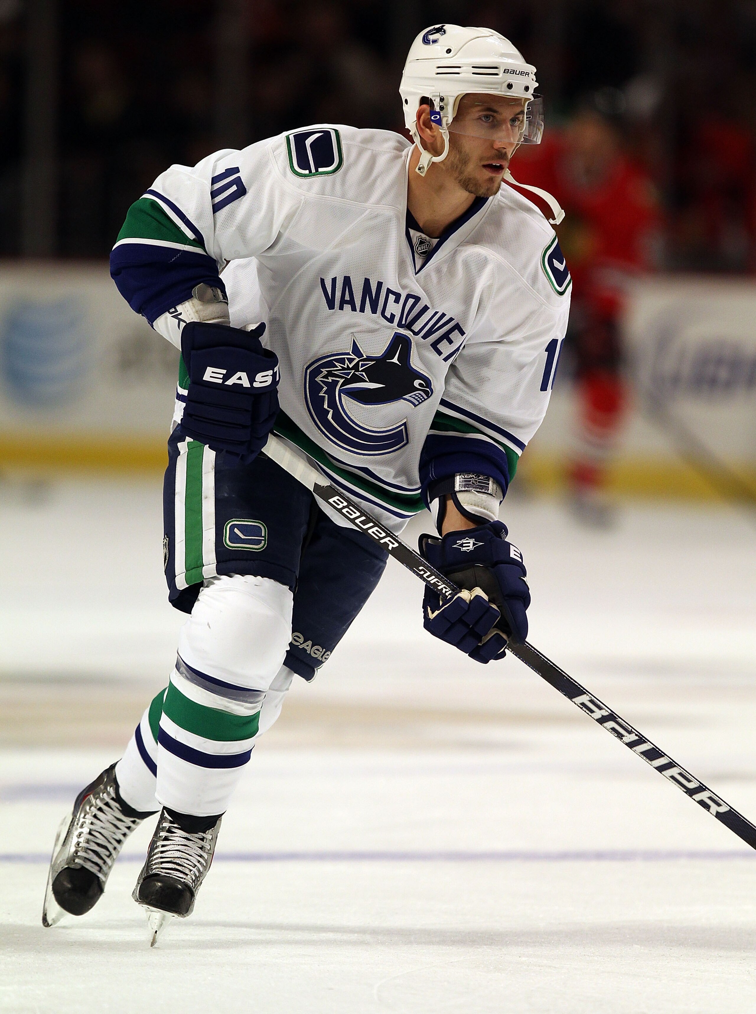 CHICAGO - OCTOBER 20: Jeff Tambellini #10 of the Vancouver Canucks participates in warm-ups before a game against the Chicago Blackhawks at the United Center on October 20, 2010 in Chicago, Illinois. The Blackhawks defeated the Canucks 2-1 in overtime.  (