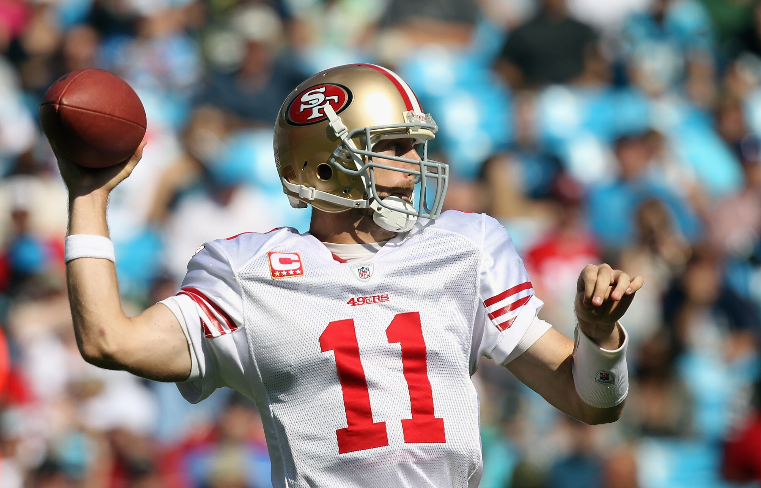 CHARLOTTE, NC - OCTOBER 24:  Alex Smith #11 of the San Francisco 49ers drops back to throw a pass against the Carolina Panthers during their game at Bank of America Stadium on October 24, 2010 in Charlotte, North Carolina.  (Photo by Streeter Lecka/Getty