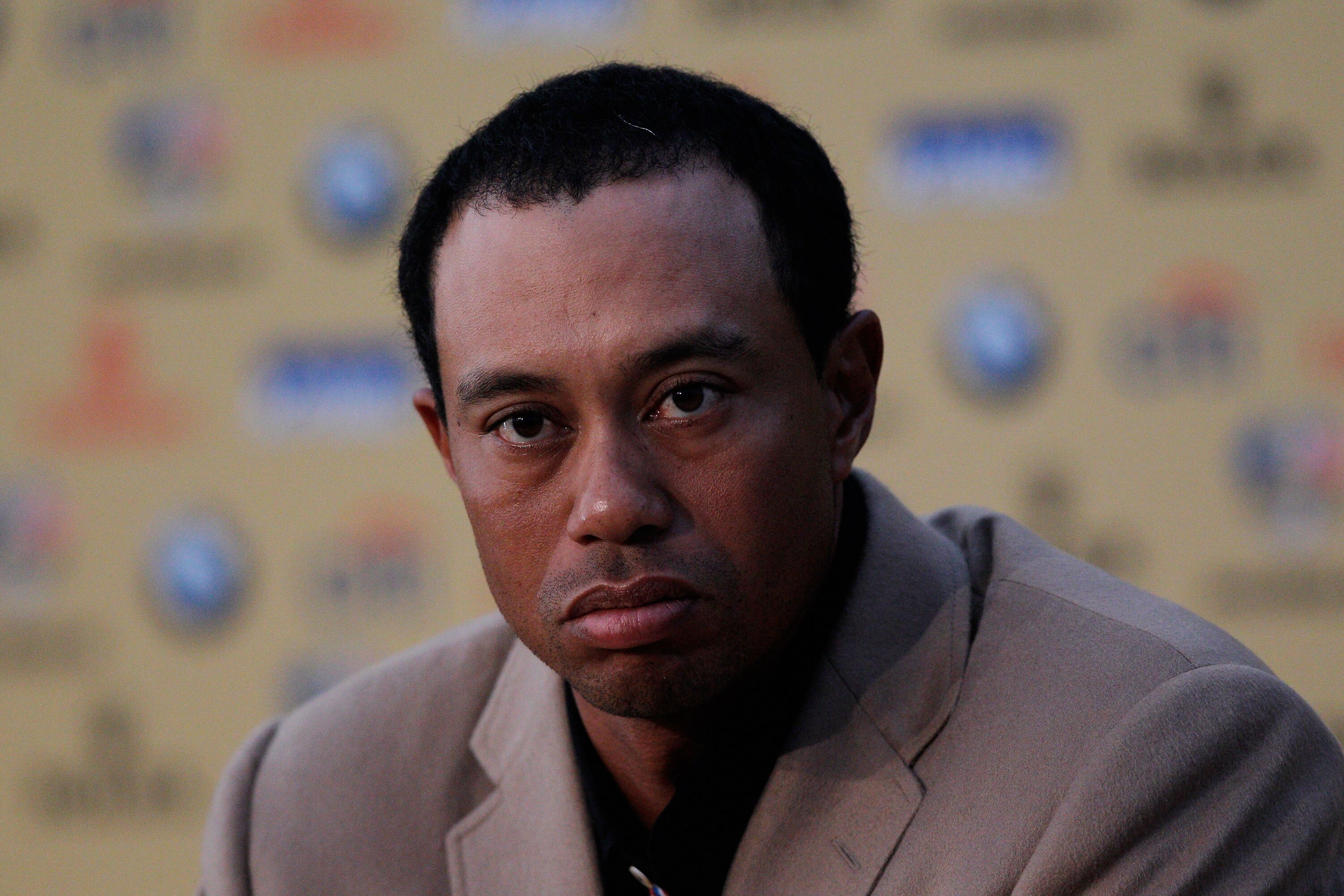 NEWPORT, WALES - OCTOBER 04: Tiger Woods of Team USA attends a press conference following Europe's 14.5 to 13.5 victory over the USA at the 2010 Ryder Cup at the Celtic Manor Resort on October 4, 2010 in Newport, Wales. (Photo by Sam Greenwood/Getty Ima NEWPORT, WALES - OCTOBER 04: Tiger Woods of Team USA attends a press conference following Europe's 14.5 to 13.5 victory over the USA at the 2010 Ryder Cup at the Celtic Manor Resort on October 4, 2010 in Newport, Wales. (Photo by Sam Greenwood/Getty Ima