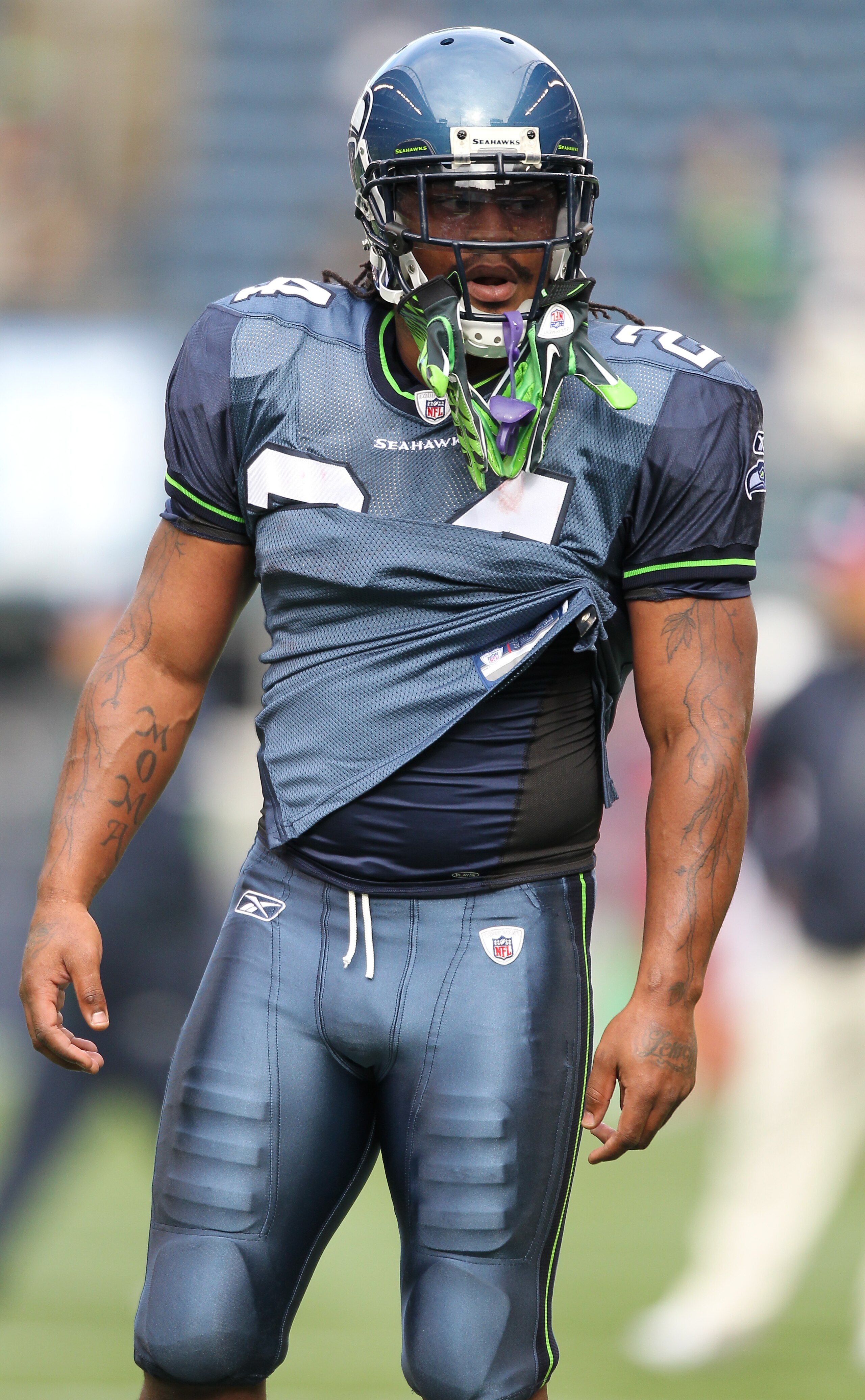 SEATTLE - OCTOBER 24:  Running back Marshawn Lynch #24 of the Seattle Seahawks looks on during warmups prior to the game against the Arizona Cardinals at Qwest Field on October 24, 2010 in Seattle, Washington. (Photo by Otto Greule Jr/Getty Images)