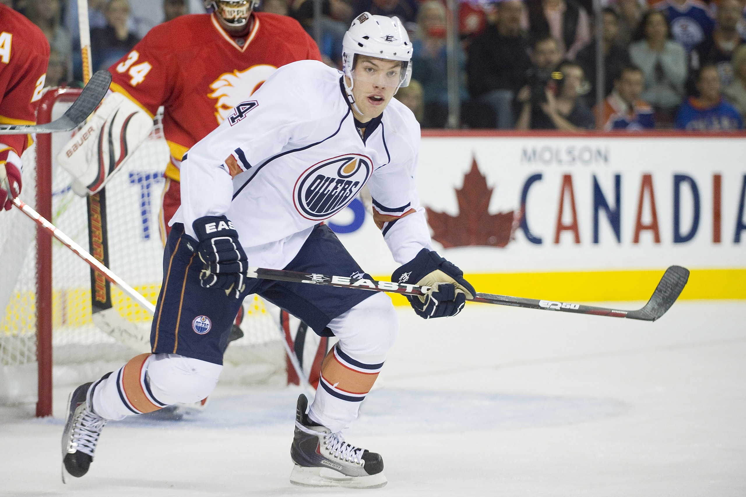 EDMONTON, CANADA - OCTOBER 16: Edmonton Oilers left wing Taylor Hall #4 follows the play during a game against the Calgary Flames at the Scotiabank Saddledome on October 16, 2010 in Calgary, Alberta, Canada. The Flames beat the Oilers 5-3. (Photo by D EDMONTON, CANADA - OCTOBER 16: Edmonton Oilers left wing Taylor Hall #4 follows the play during a game against the Calgary Flames at the Scotiabank Saddledome on October 16, 2010 in Calgary, Alberta, Canada. The Flames beat the Oilers 5-3. (Photo by D