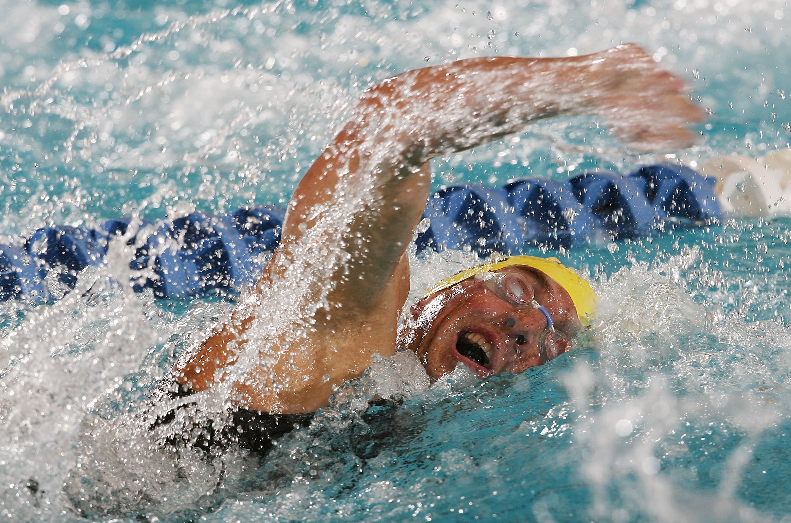 INDIANAPOLIS - AUGUST 02:  Fran Crippen swims in the Men's 400m Freestyle B-Final at the ConocoPhillips USA Swimming National Championships at the Indiana State University Natatorium on August 2, 2007 in Indianapolis, Indiana.  (Photo by Nick Laham/Getty