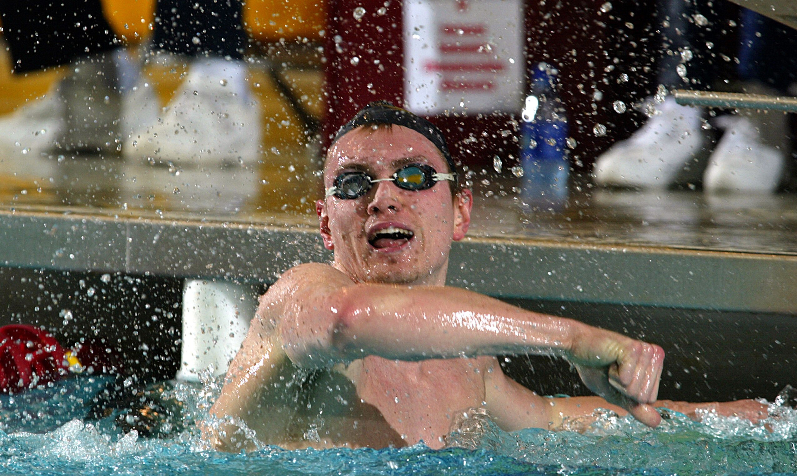 23 Mar 2002:  Chris Thompson of Club Wolverine celebrates his win in the Men's 1500M Freestyle after running down Fran Crippen on the last lap of the race in the finals of the during the Phillips 66 U.S. National Swimming Championships at the University A
