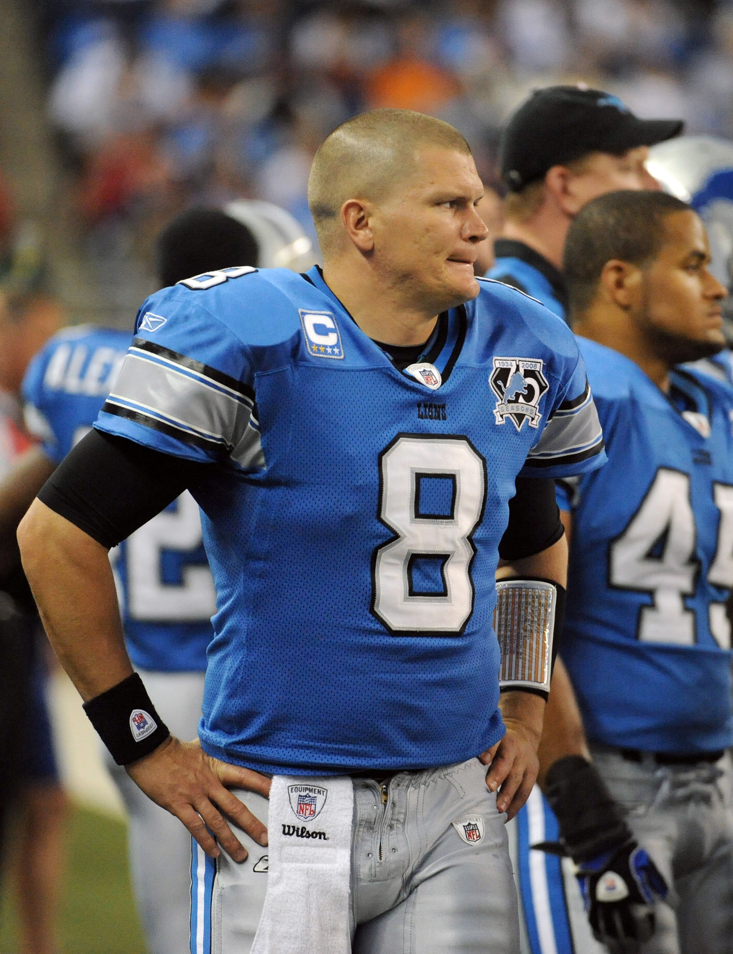 DETROIT - OCTOBER 05:  Jon Kitna #8 of the Detroit Lions watches from the sidelines after he is replaced by Dan Orlovsky during the third quarter at Ford Field on October 5, 2008 in Detroit, Michigan.  The Bears won 34-7.  (Photo by Harry How/Getty Images