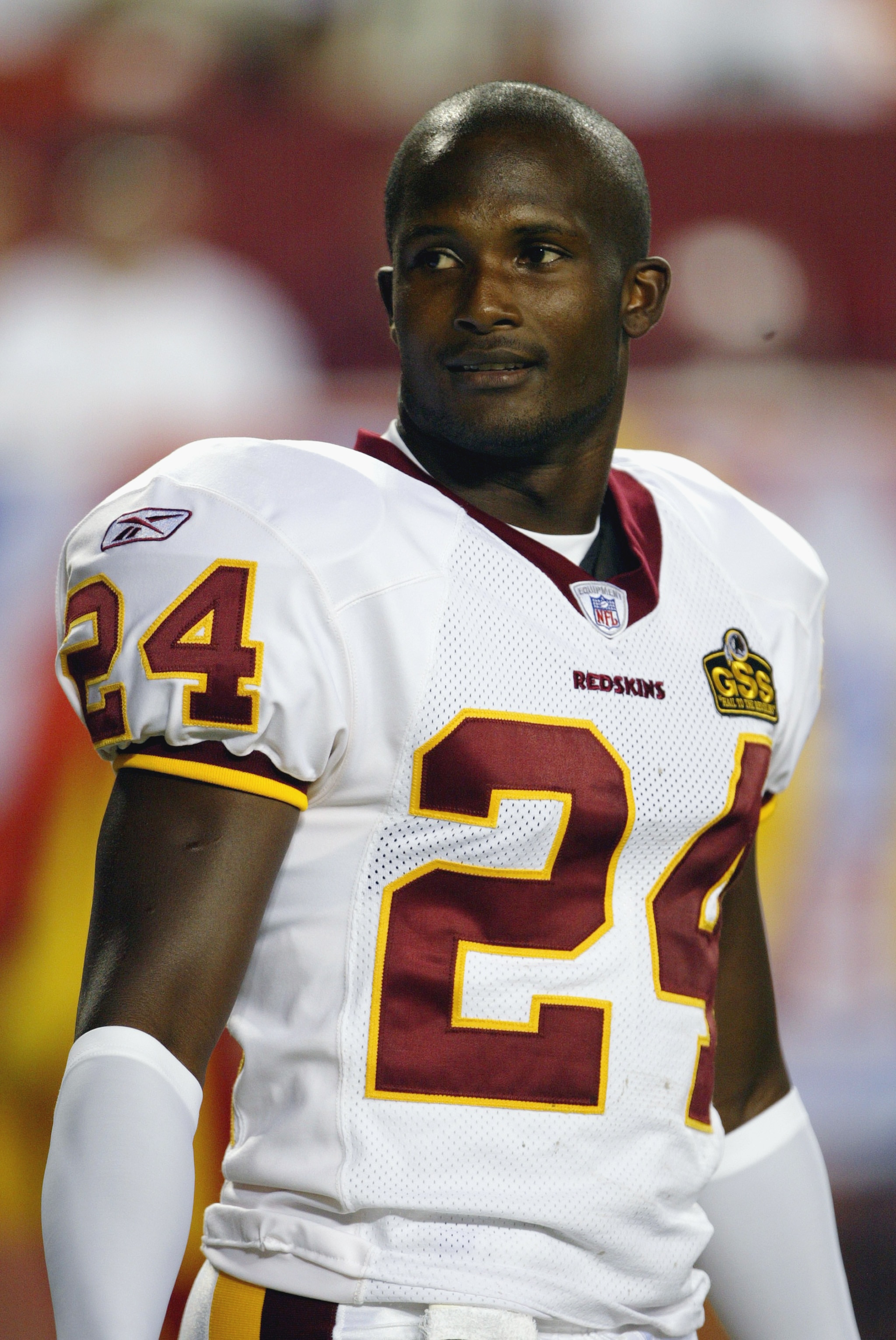 LANDOVER, MD - SEPTEMBER 4:  Champ Bailey #24 of the Washington Redskins looks on during a game against the New York Jets on September 4, 2003 at the Fed Ex Field in Landover, Maryland. The Redskins defeated the Jets 16-13. (Photo by Doug Pensinger/Getty