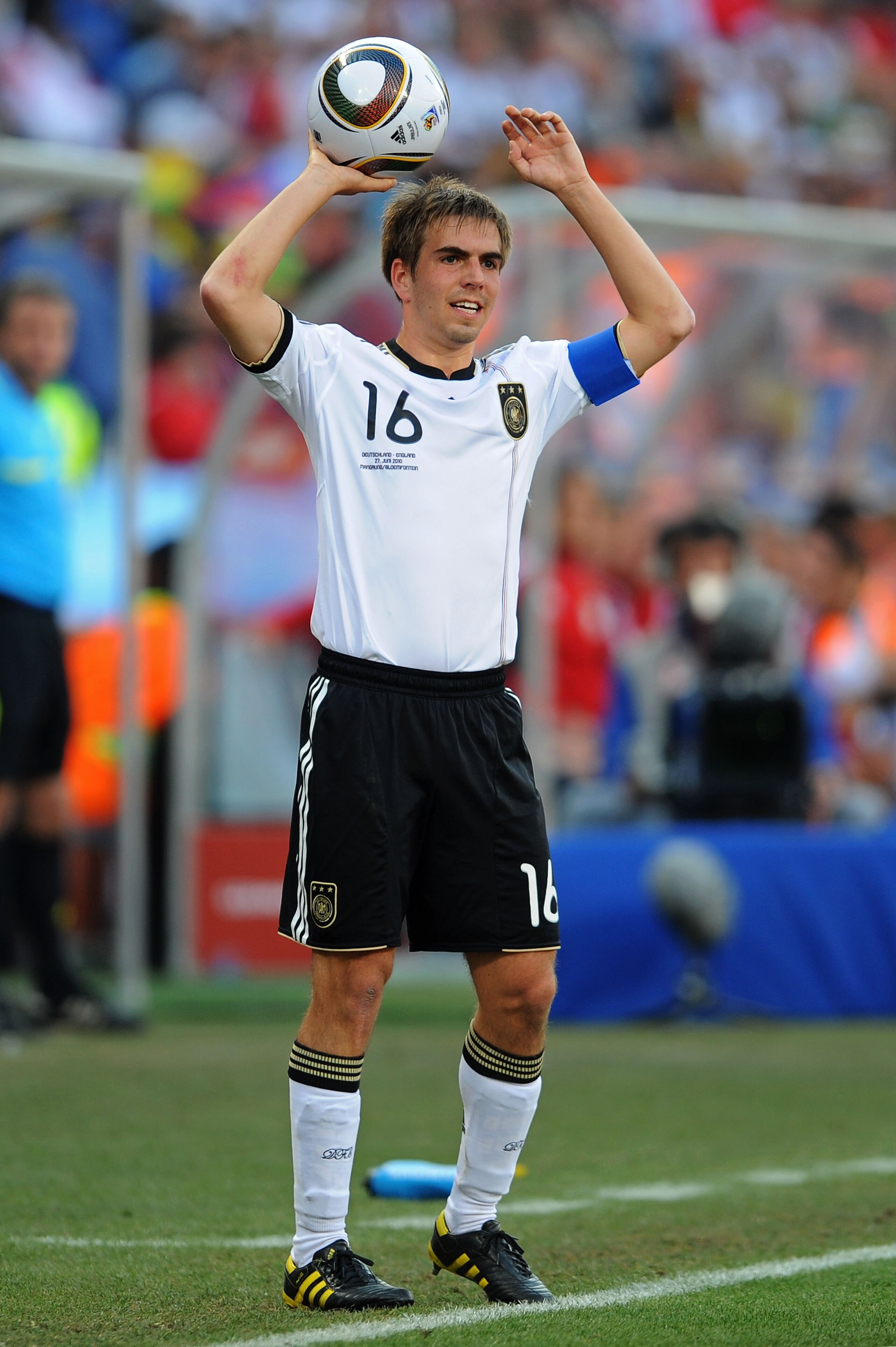 BLOEMFONTEIN, SOUTH AFRICA - JUNE 27: Philipp Lahm of Germany takes a throw in during the 2010 FIFA World Cup South Africa Round of Sixteen match between Germany and England at Free State Stadium on June 27, 2010 in Bloemfontein, South Africa. (Photo by BLOEMFONTEIN, SOUTH AFRICA - JUNE 27: Philipp Lahm of Germany takes a throw in during the 2010 FIFA World Cup South Africa Round of Sixteen match between Germany and England at Free State Stadium on June 27, 2010 in Bloemfontein, South Africa. (Photo by