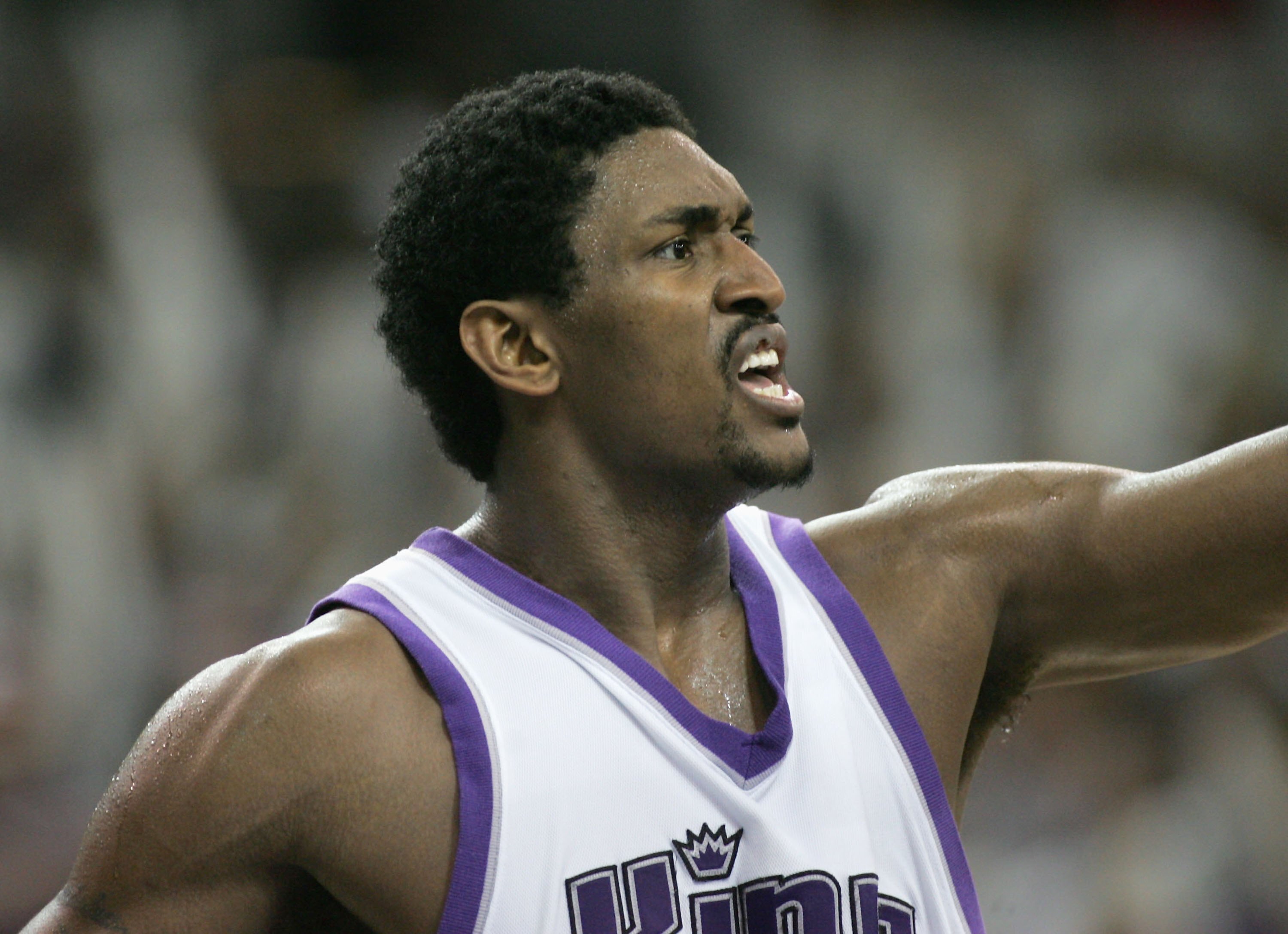 SACRAMENTO, CA - APRIL 30:  Ron Artest #93 of the Sacramento Kings shouts to a teammate against the San Antonio Spurs in game four of the Western Conference Quarterfinals during the 2006 NBA Playoffs April 30, 2006 at Arco Arena in Sacramento, California.