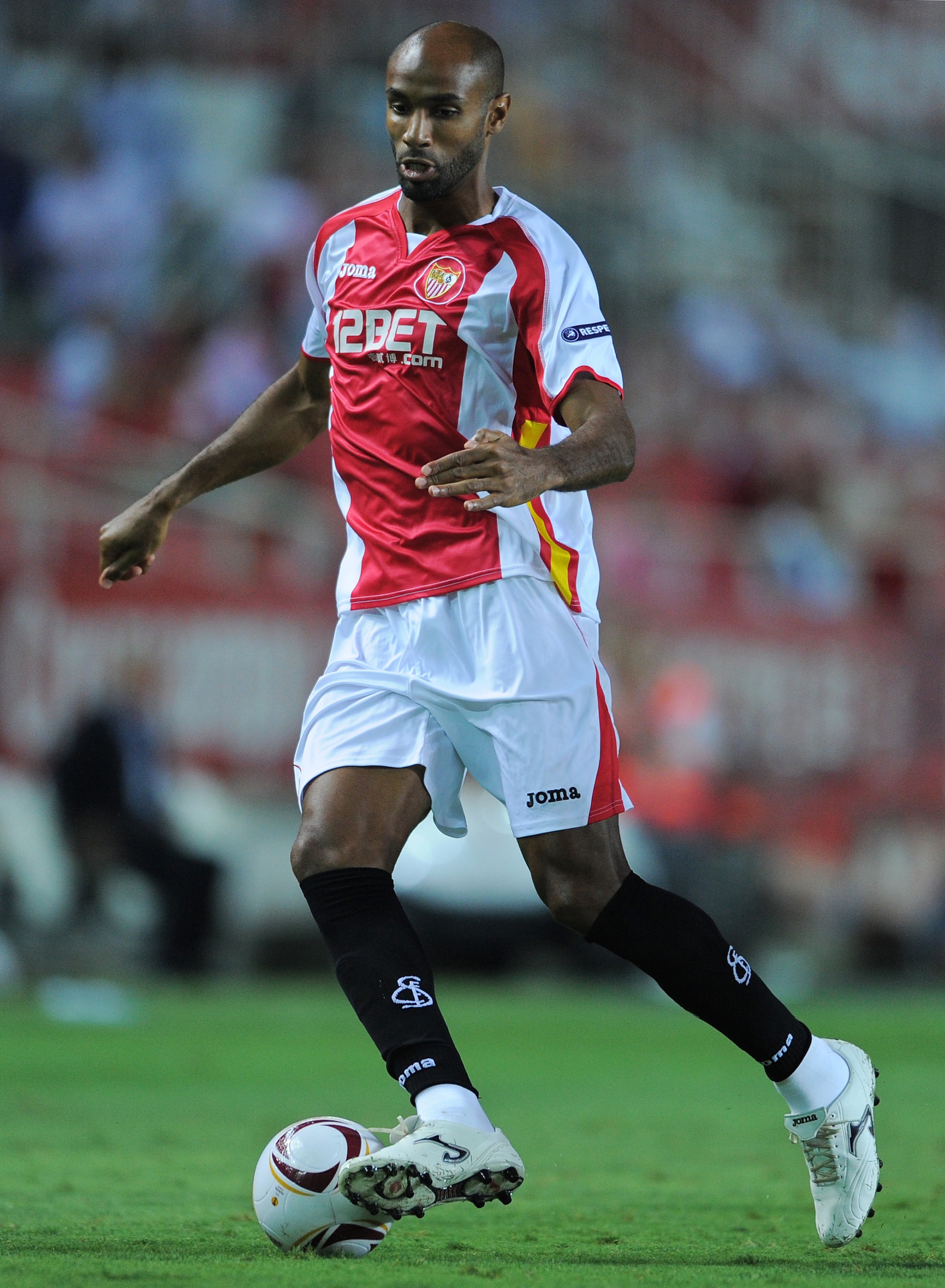 SEVILLE, SPAIN - SEPTEMBER 16:  Frederic Kanoute of Sevilla controls the ball during the UEFA Europa League group J match between Sevilla and Paris Saint Germain at the Estadio Ramon Sanchez Pizjuan on September 16, 2010 in Seville, Spain. Paris Saint Ger