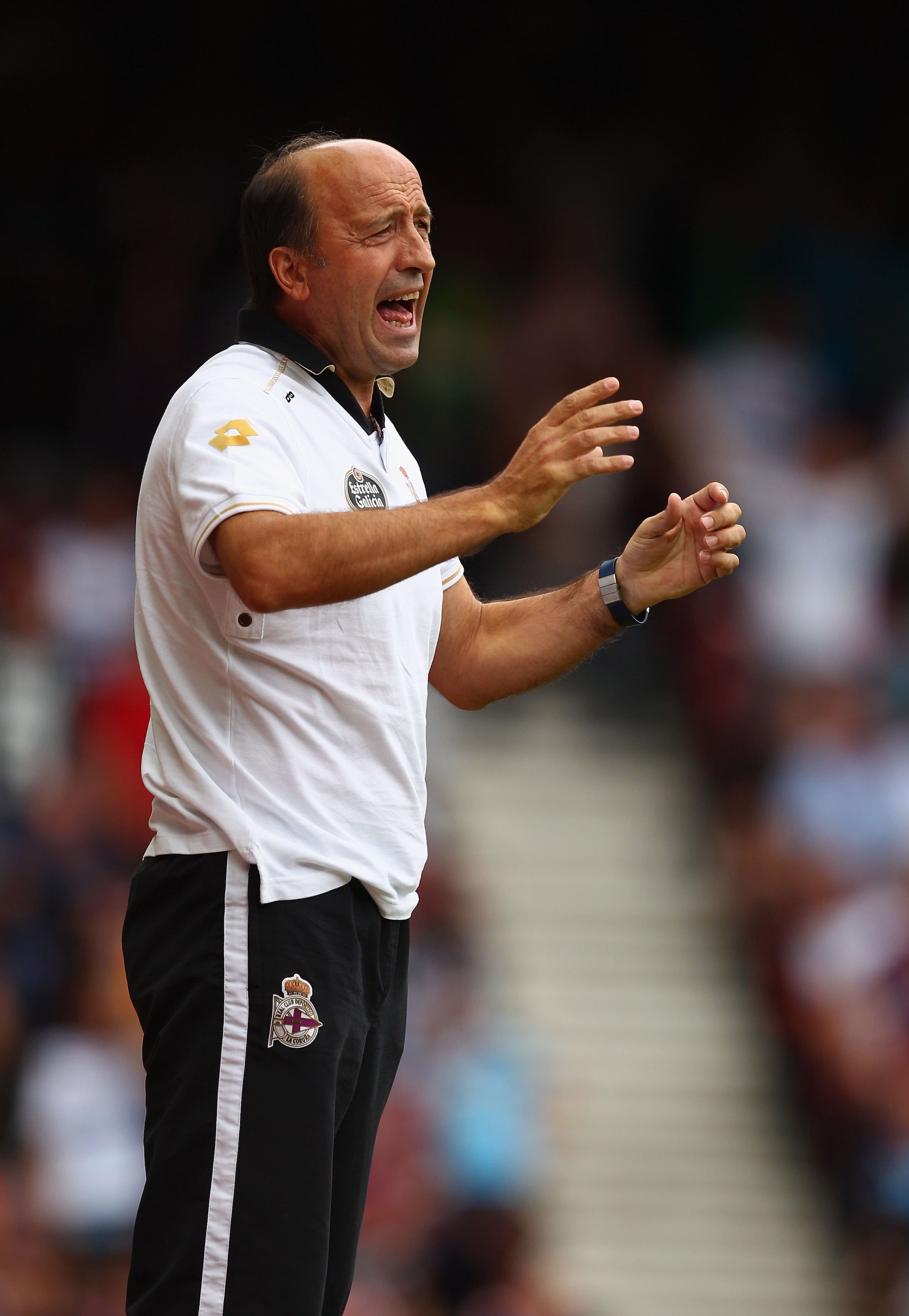 LONDON, ENGLAND - AUGUST 07:  Deportivo manager Miguel Angel Lotina shouts instructions during the pre-season friendly match between West Ham United and Deportivo La Coruna at Upton Park on August 7, 2010 in London, England.  (Photo by Richard Heathcote/G