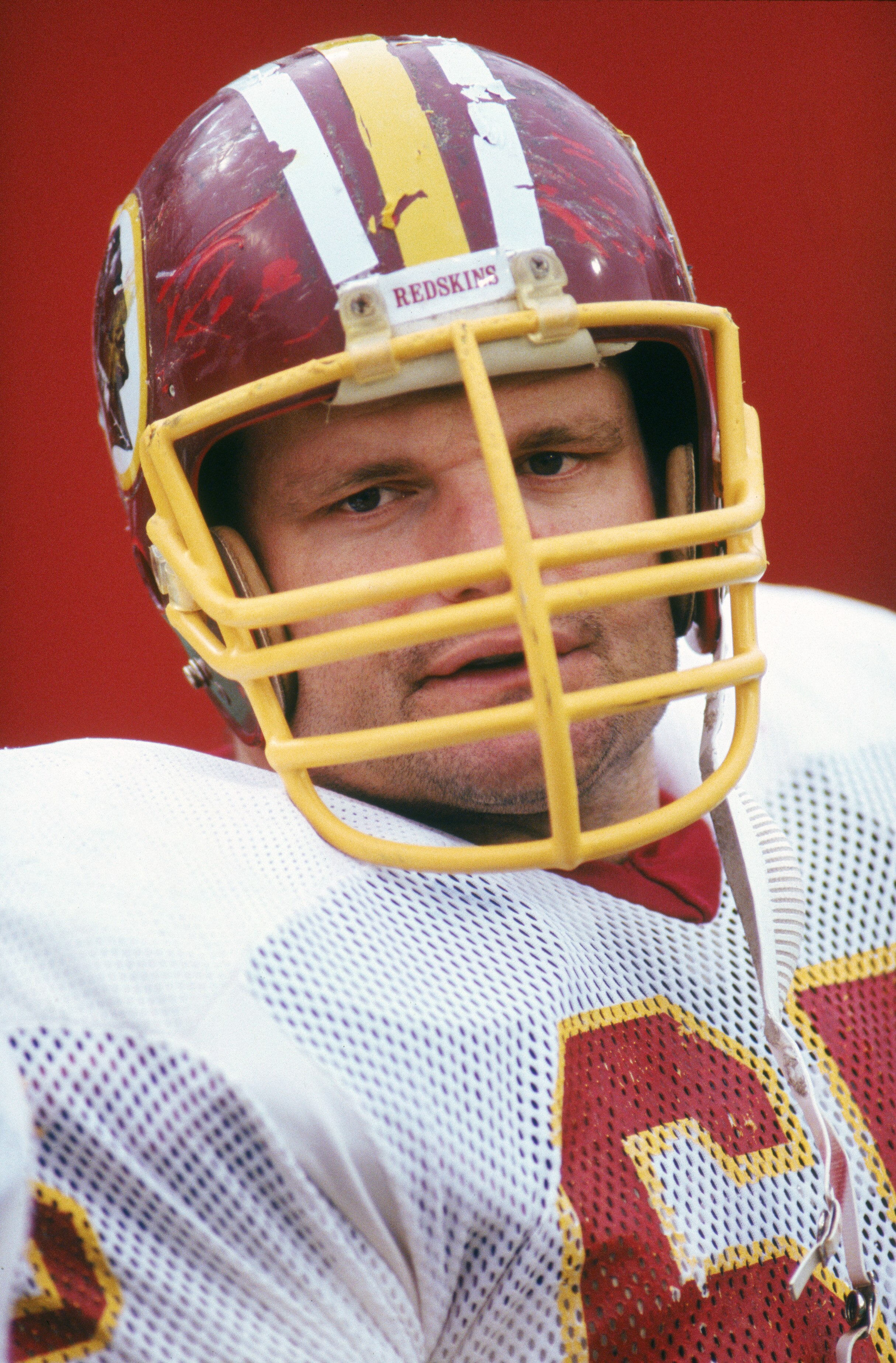 ORCHARD PARK,NY - 1987:  Dave Butz #65 of the Washington Redskins looks on the field during a1987 season game against the Buffalo Bills at Ralph Wilson Stadium in Orchard Park, New York.  (Photo by: Rick Stewart/Getty Images)