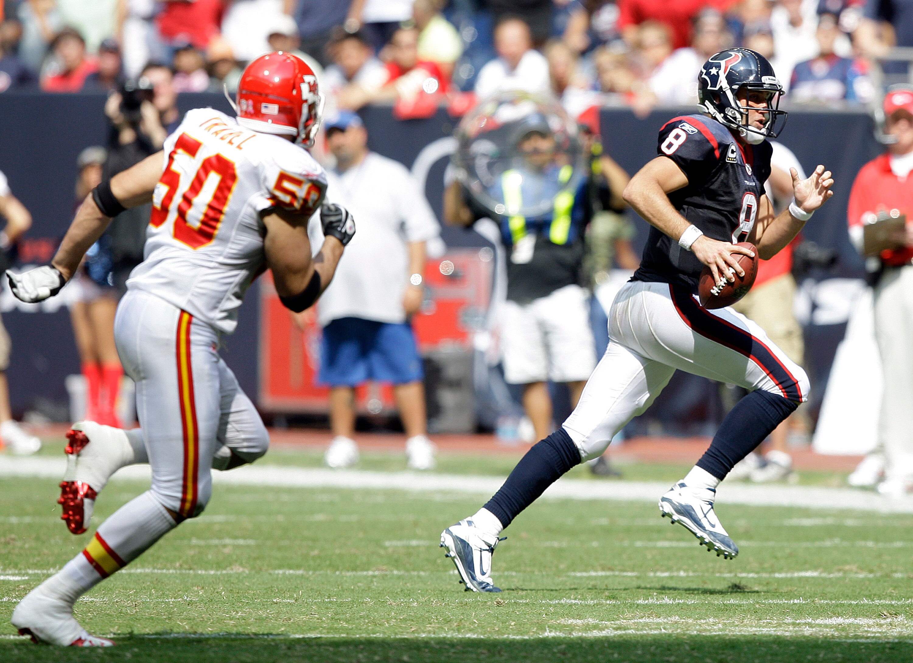 HOUSTON - OCTOBER 17:  Quarterback Matt Schaub #8 of the Houton Texans scrambles out of the pocket as he looks for a receiver agasint the Kasnas City Chiefs at Reliant Stadium on October 17, 2010 in Houston, Texas.  (Photo by Bob Levey/Getty Images)