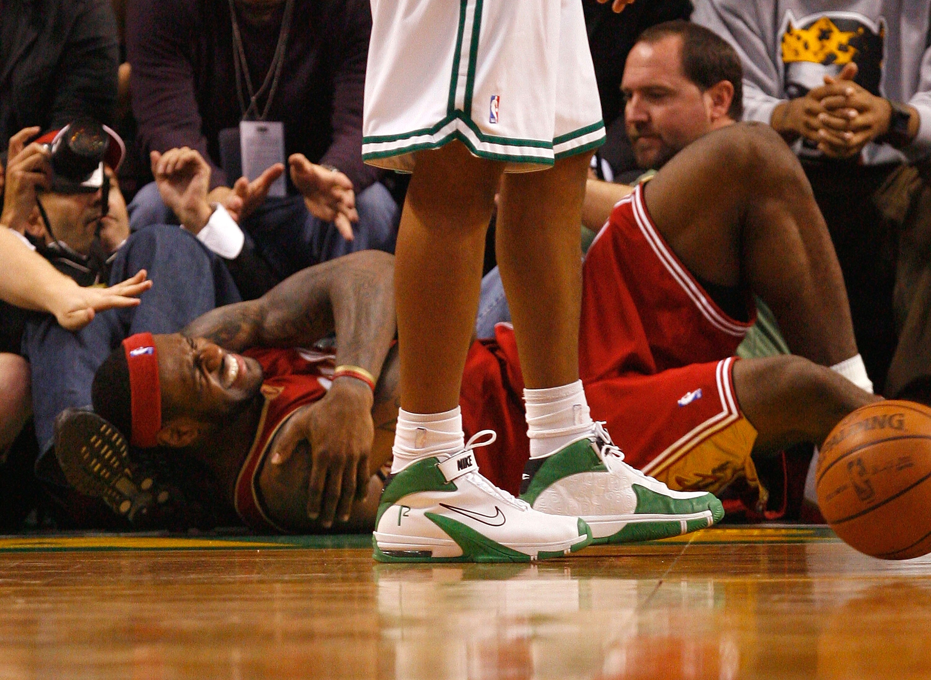 BOSTON - MAY 18:  LeBron James #23 of the Cleveland Cavaliers grabs his shoulder as he grimaces in pain against the Boston Celtics in Game Seven of the Eastern Conference Semifinals during the 2008 NBA Playoffs at the TD Banknorth Garden May 18, 2008 in B
