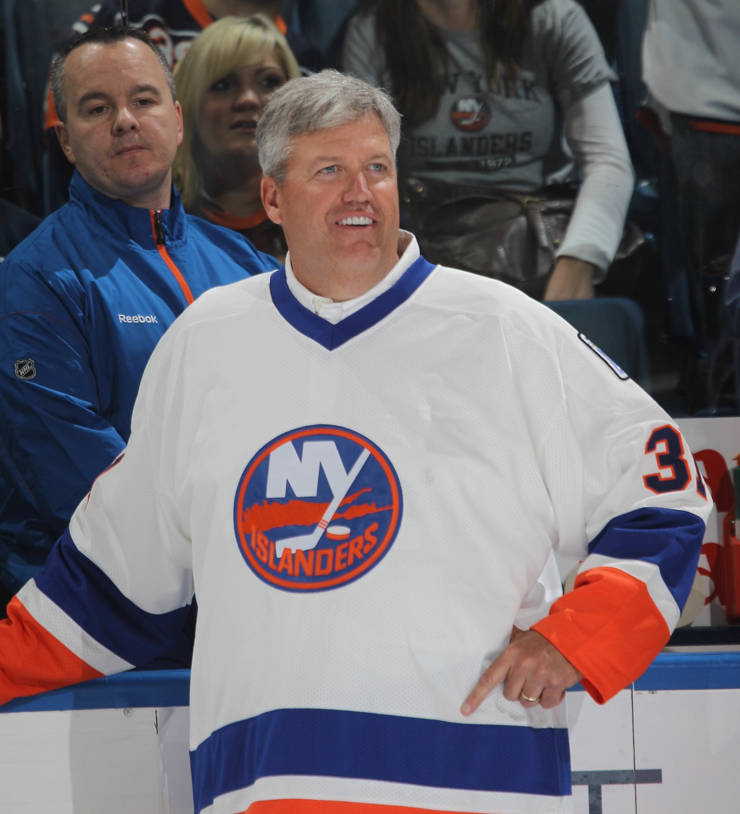 UNIONDALE, NY - OCTOBER 09:  New York Jets coach Rex Ryan gets ready to drop the ceremonial puck between Brenden Morrow #10 of the Dallas Stars and Doug Weight #93 of the New York Islanders prior to the Islanders home opener at the Nassau Coliseum on Octo