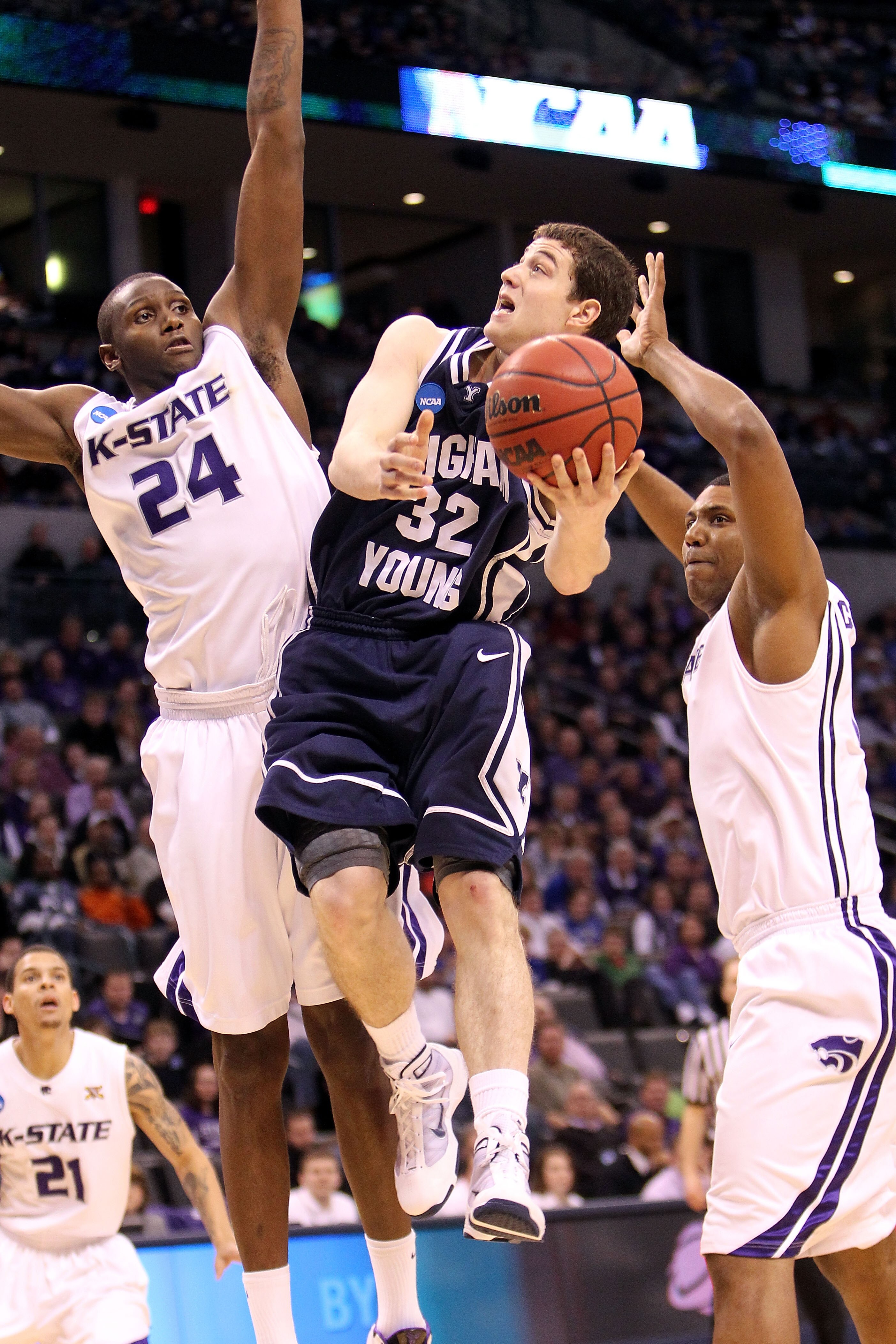 OKLAHOMA CITY - MARCH 20:  Jimmer Fredette #32 of the Brigham Young Cougars drives for a shot attempt against the Kansas State Wildcats during the second round of the 2010 NCAA men's basketball tournament at Ford Center on March 20, 2010 in Oklahoma City,