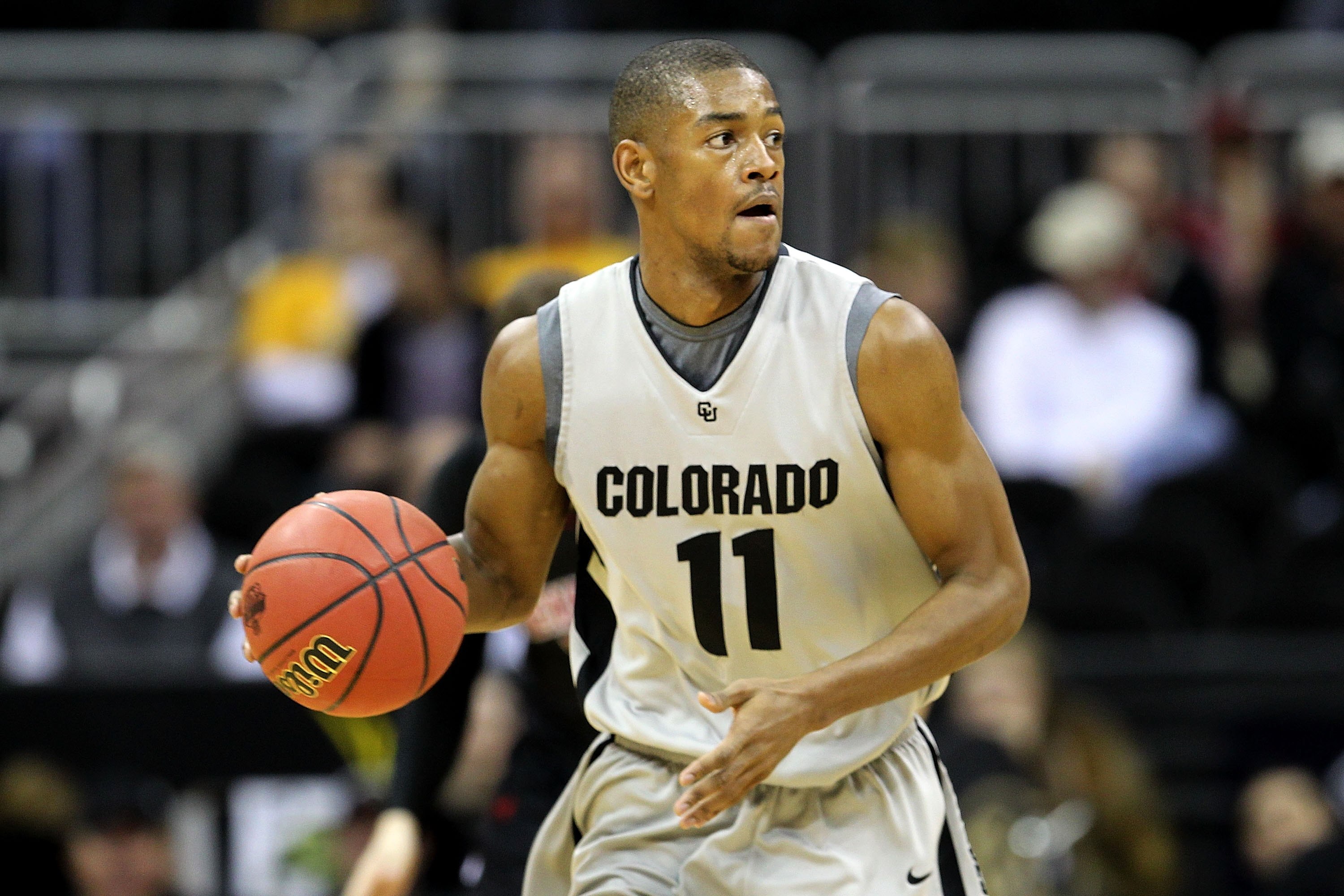 KANSAS CITY, MO - MARCH 10:  Cory Higgins #11 of the Colorado Buffaloes moves the ball in the first half against the Texas Tech Red Raiders during the first round game of the 2010 Phillips 66 Big 12 Men's Basketball Tournament at the Sprint Center on Marc