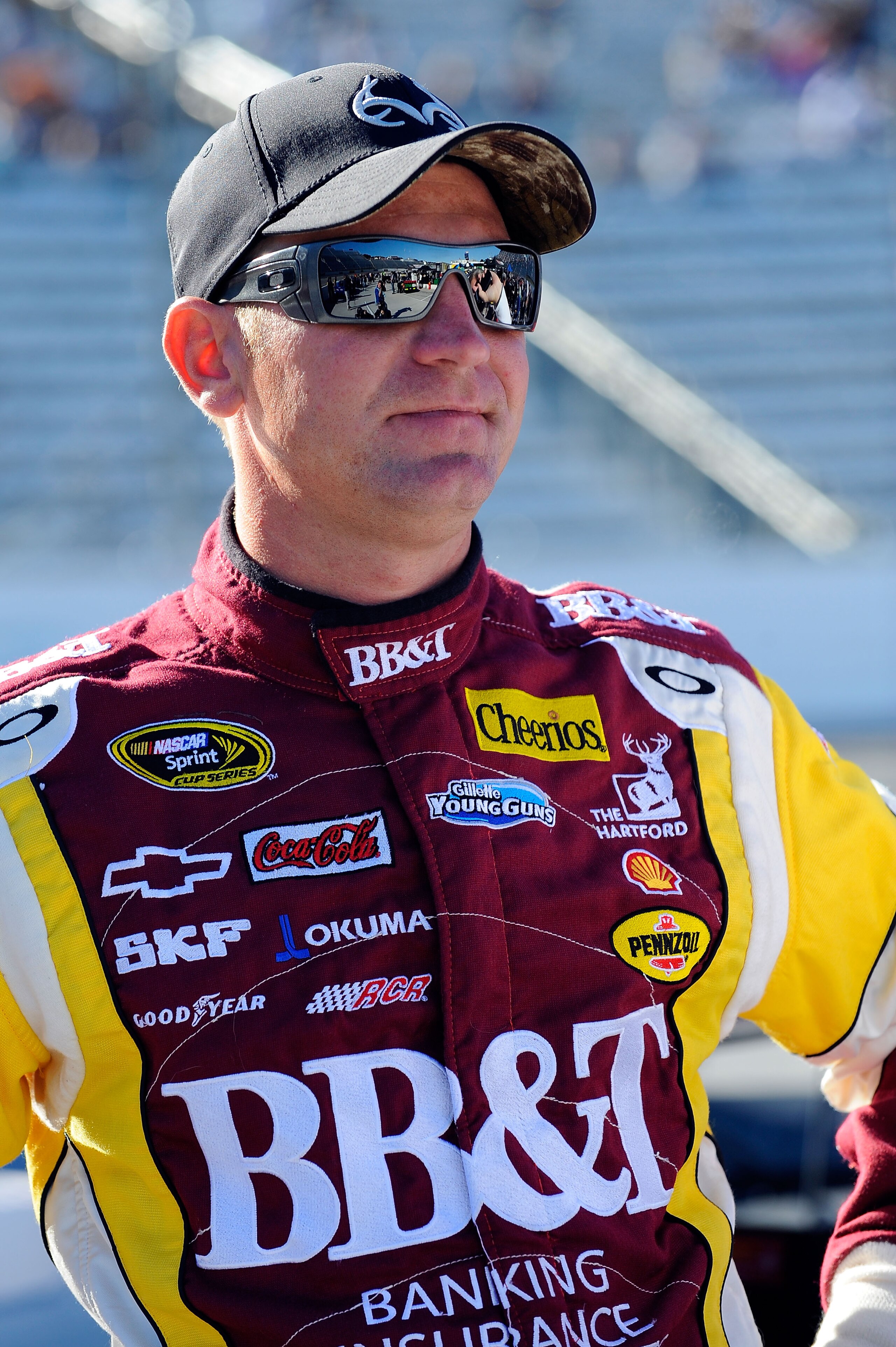 MARTINSVILLE, VA - OCTOBER 22:  Clint Bowyer, driver of the #33 BB&T Chevrolet, stands on pit road during qualifying for the NASCAR Sprint Cup Series TUMS Fast Relief 500 at Martinsville Speedway on October 22, 2010 in Martinsville, Virginia.  (Photo by J