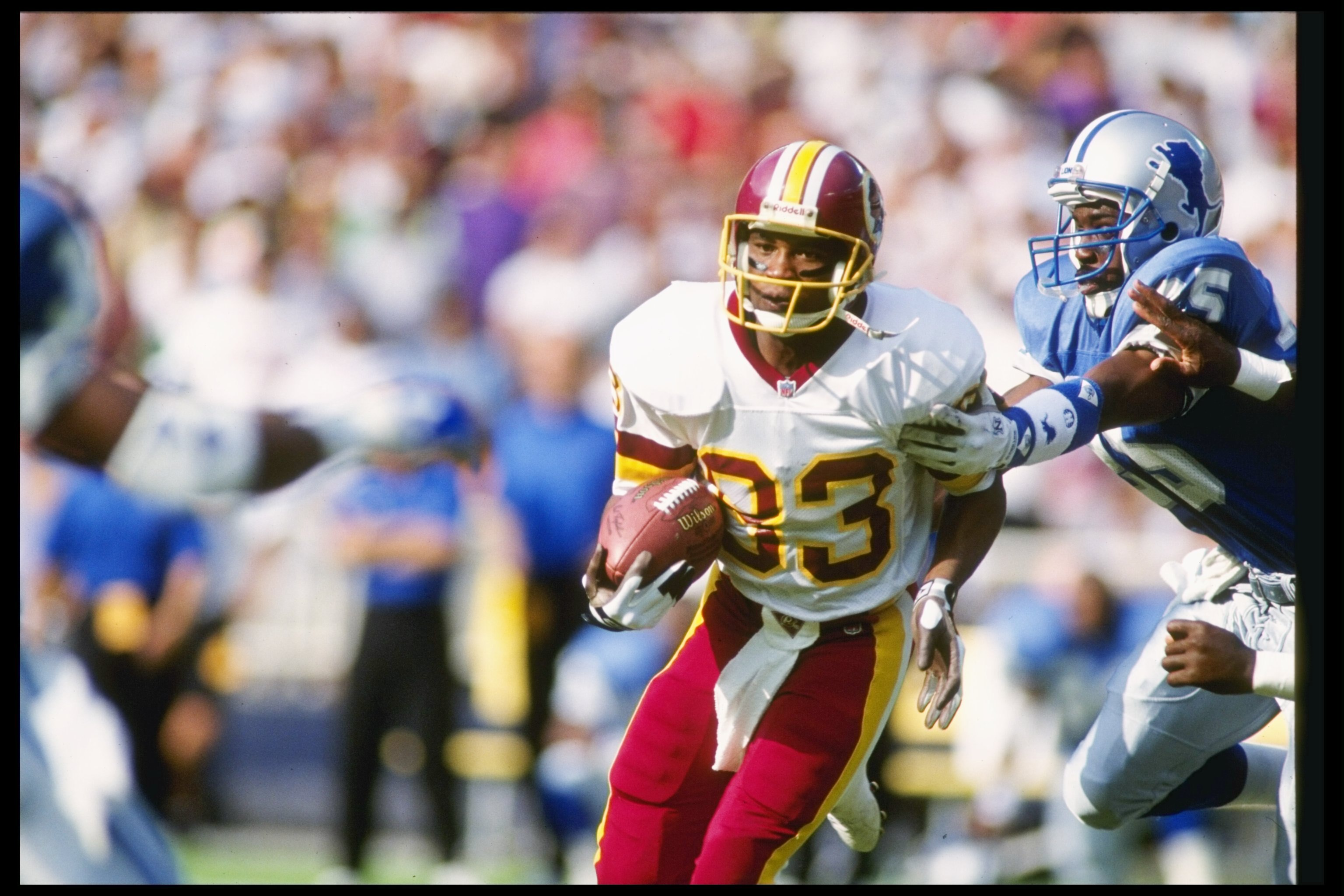 20 Sep 1992:  Wide receiver Ricky Sanders of the Washington Redskins moves the ball during a game against the Detroit Lions at RFK Stadium in Washington, D. C.  The Redskins won the game, 13-10. Mandatory Credit: Rick Stewart  /Allsport