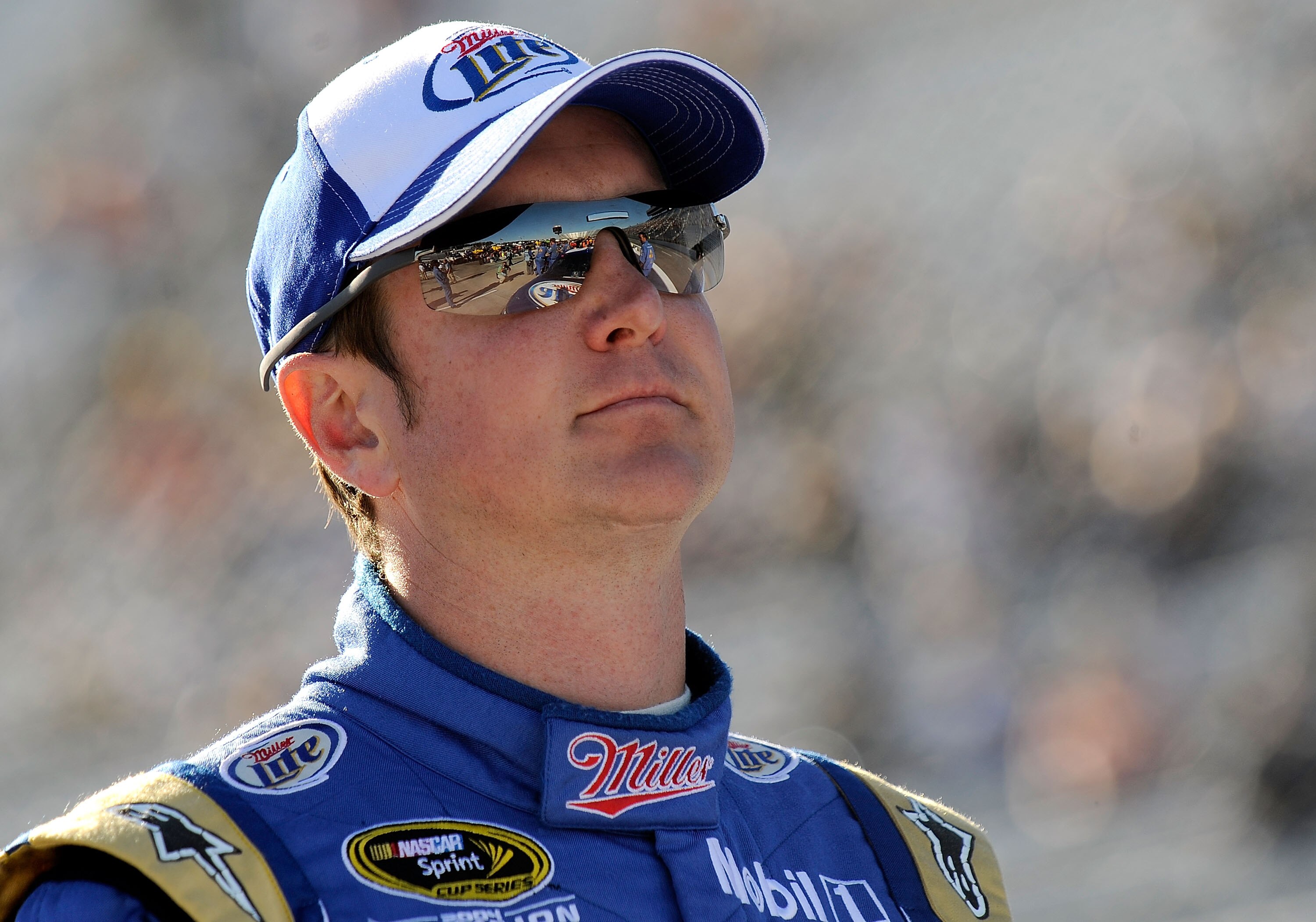 MARTINSVILLE, VA - OCTOBER 22:  Kurt Busch, driver of the #2 Operation Home Front/Miller Lite Dodge, stands next to his car on pit road during qualifying for the NASCAR Sprint Cup Series TUMS Fast Relief 500 at Martinsville Speedway on October 22, 2010 in