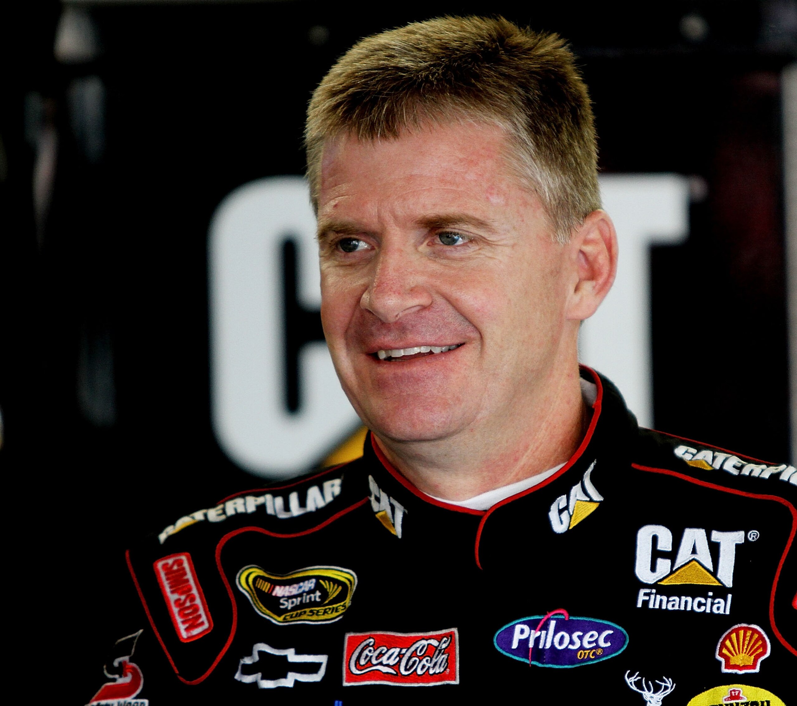 CONCORD, NC - OCTOBER 14:  Jeff Burton, driver of the #31 Caterpillar Chevrolet, strands in the garage during practice for the NASCAR Sprint Cup Series Bank of America 500 at Charlotte Motor Speedway on October 14, 2010 in Concord, North Carolina.  (Photo