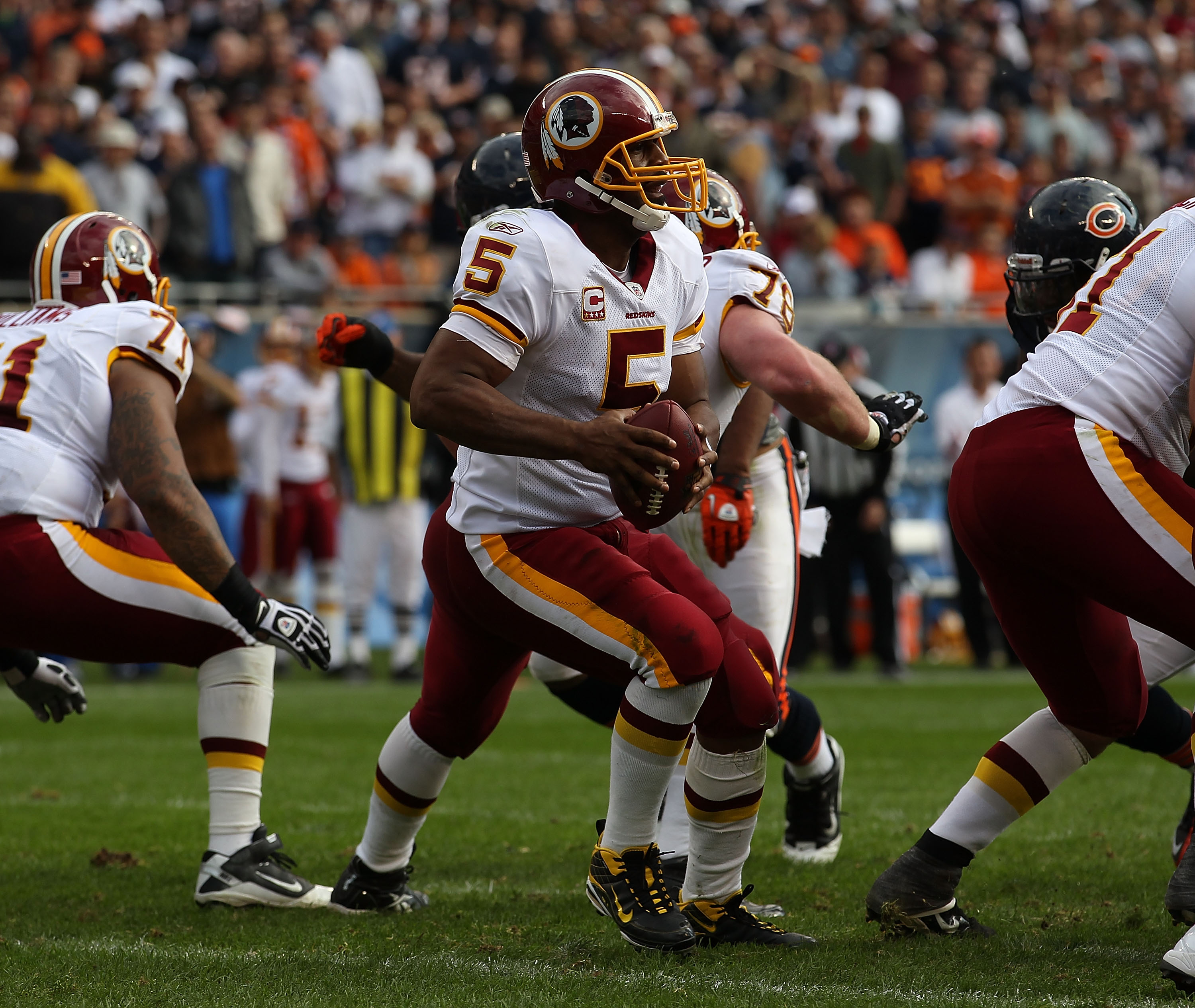 CHICAGO - OCTOBER 24: Donovan McNabb #5 of the Washington Redskins drops back to pass against the Chicago Bears at Soldier Field on October 24, 2010 in Chicago, Illinois. The Redskins defeated the Bears 17-14. (Photo by Jonathan Daniel/Getty Images)