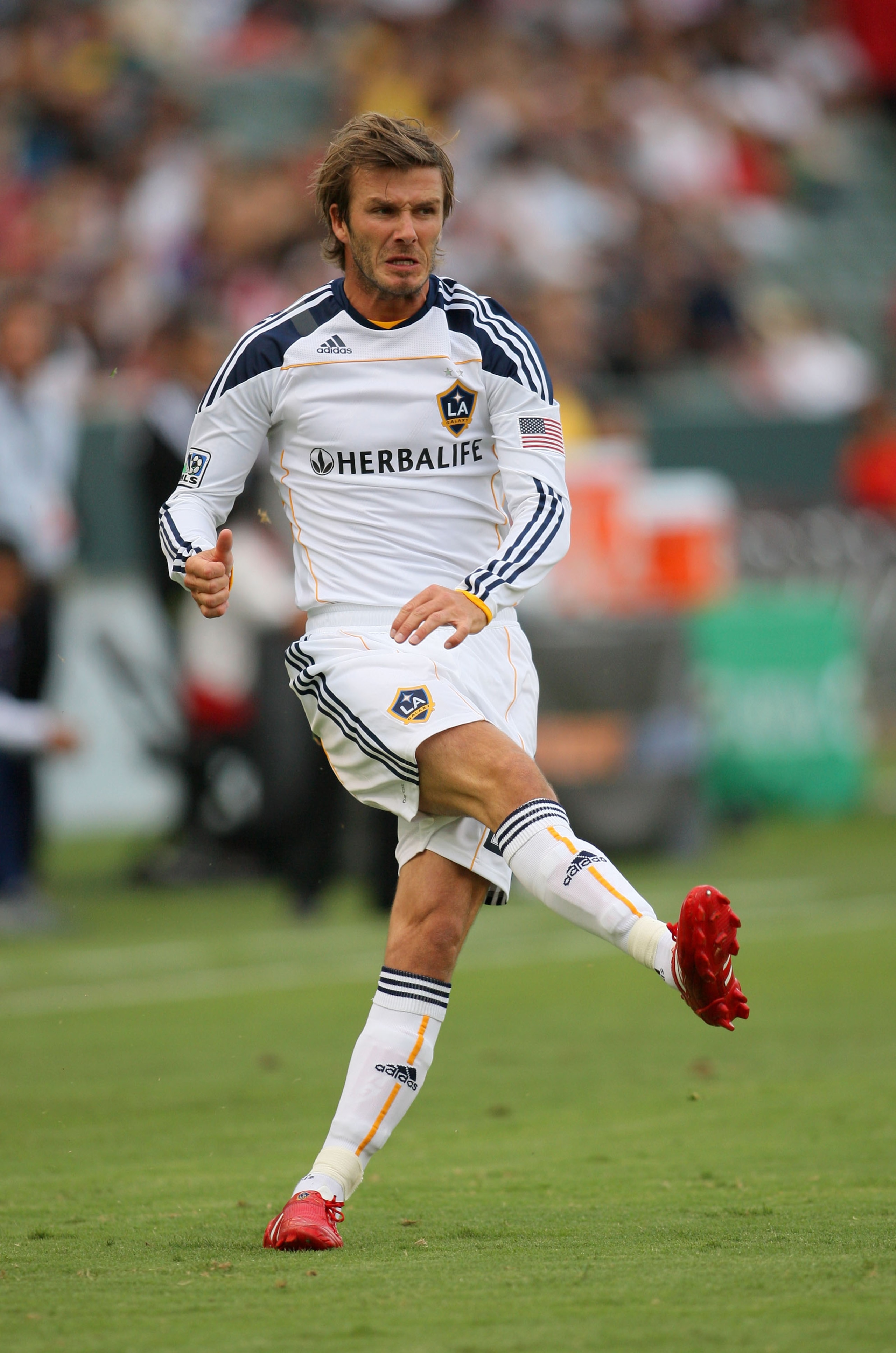 CARSON, CA - OCTOBER 03:  David Beckham #23 of the Los Angeles Galaxy follows through on his cross in the first half during the MLS match against Chivas USA at The Home Depot Center on October 3, 2010 in Carson, California. The Galaxy defeated Chivas USA