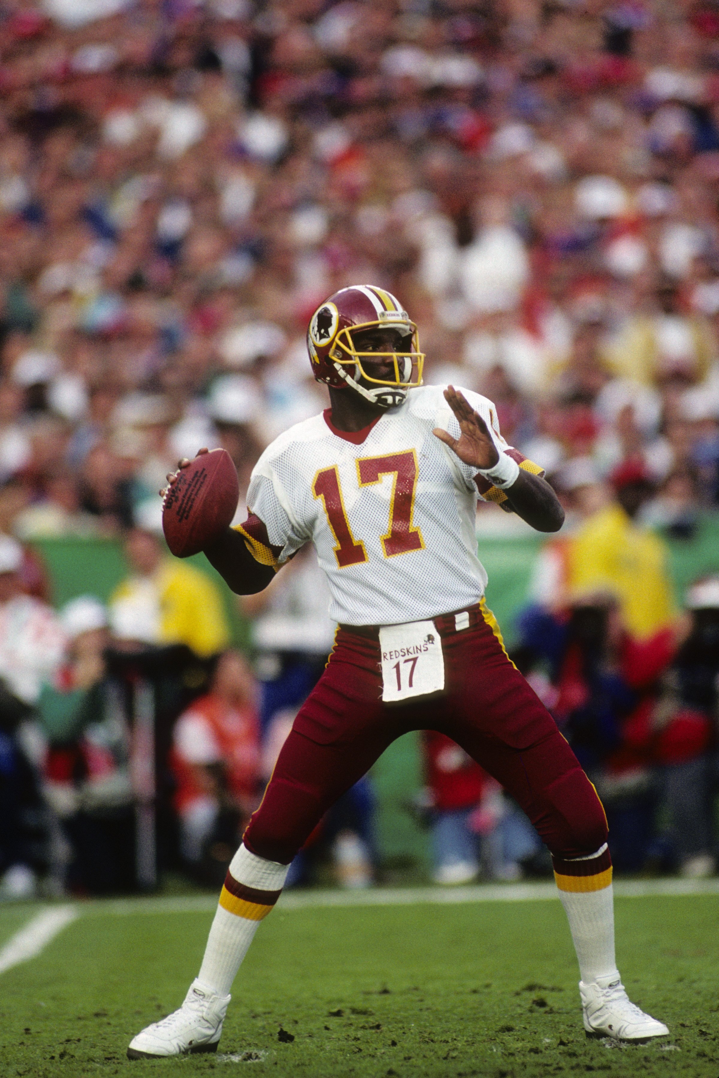SAN DIEGO - JANUARY 31:  Quarterback Doug Williams #10 of the Washington Redskins drops back to pass during Super Bowl XXII against the Denver Broncos at Jack Murphy Stadium on January 31, 1988 in San Diego, California.  The Redskins won 42-10.  (Photo by