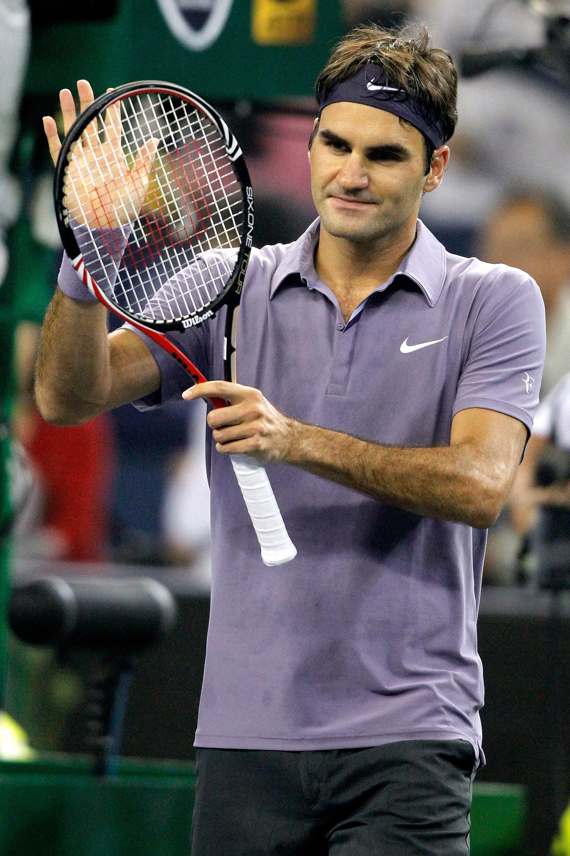 SHANGHAI, CHINA - OCTOBER 16:  Roger Federer of Switzerland acknowledges the crowd after his win over Novak Djokovic of Serbia during day six of the 2010 Shanghai Rolex Masters at the Shanghai Qi Zhong Tennis Center on October 16, 2010 in Shanghai, China.