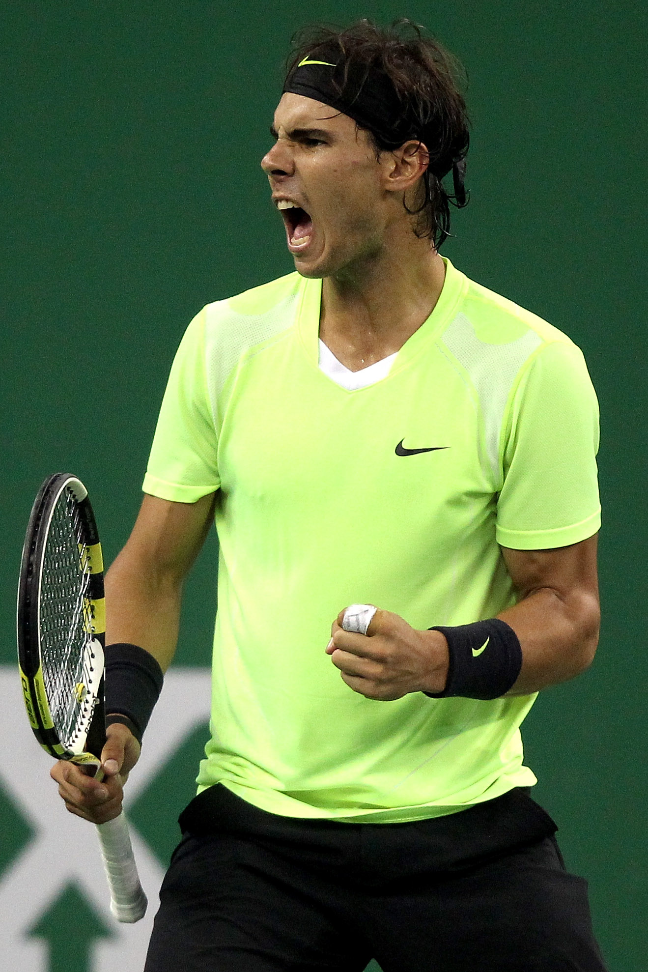 SHANGHAI, CHINA - OCTOBER 14:  Rafael Nadal of Spain celebrates a point against Jurgen Melzer of Austria during day four of the 2010 Shanghai Rolex Masters at the Shanghai Qi Zhong Tennis Center on October 13, 2010 in Shanghai, China.  (Photo by Matthew S