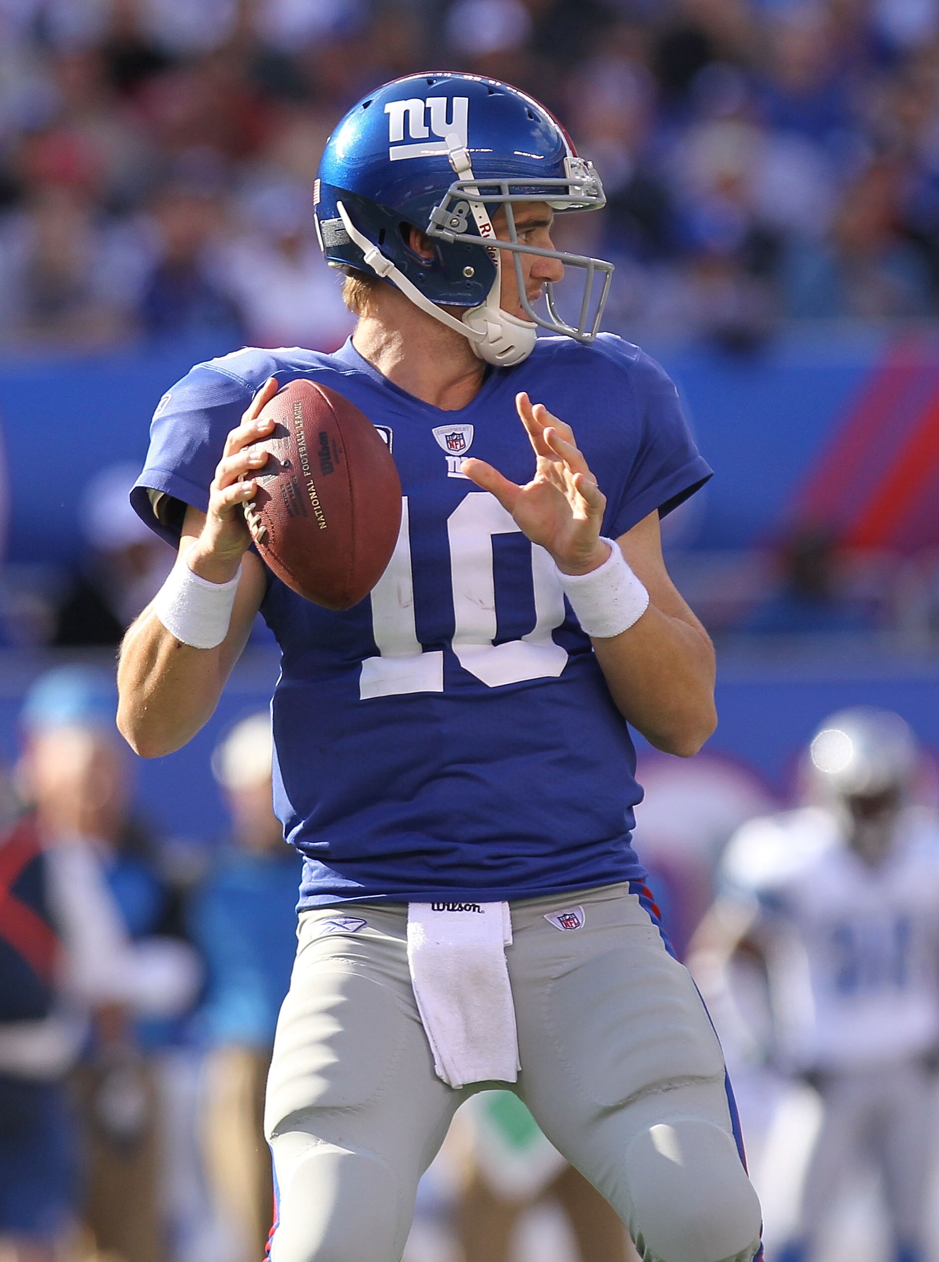 EAST RUTHERFORD, NJ - OCTOBER 17:  Eli Manning #10 of the New York Giants passes against the Detroit Lions at New Meadowlands Stadium on October 17, 2010 in East Rutherford, New Jersey.  (Photo by Nick Laham/Getty Images)