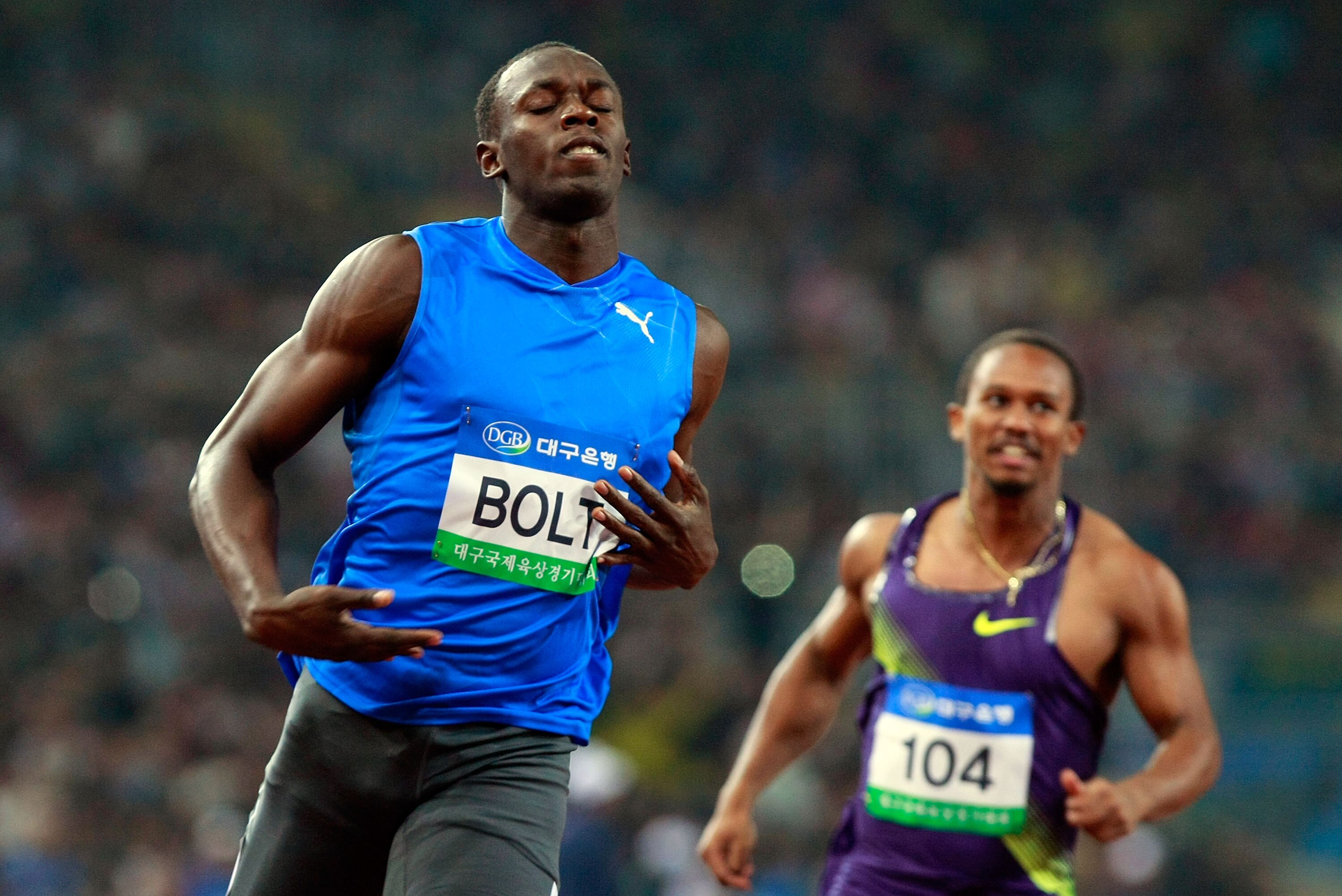 DAEGU, SOUTH KOREA - MAY 19:  Usain Bolt of Jamaica celebrates after crossing the finish line of the men's 100 metres during the Colorful Daegu Pre-Championships Meeting 2010 at Daegu Stadium on May 19, 2010 in Daegu, South Korea. Bolt won the race at 9.8